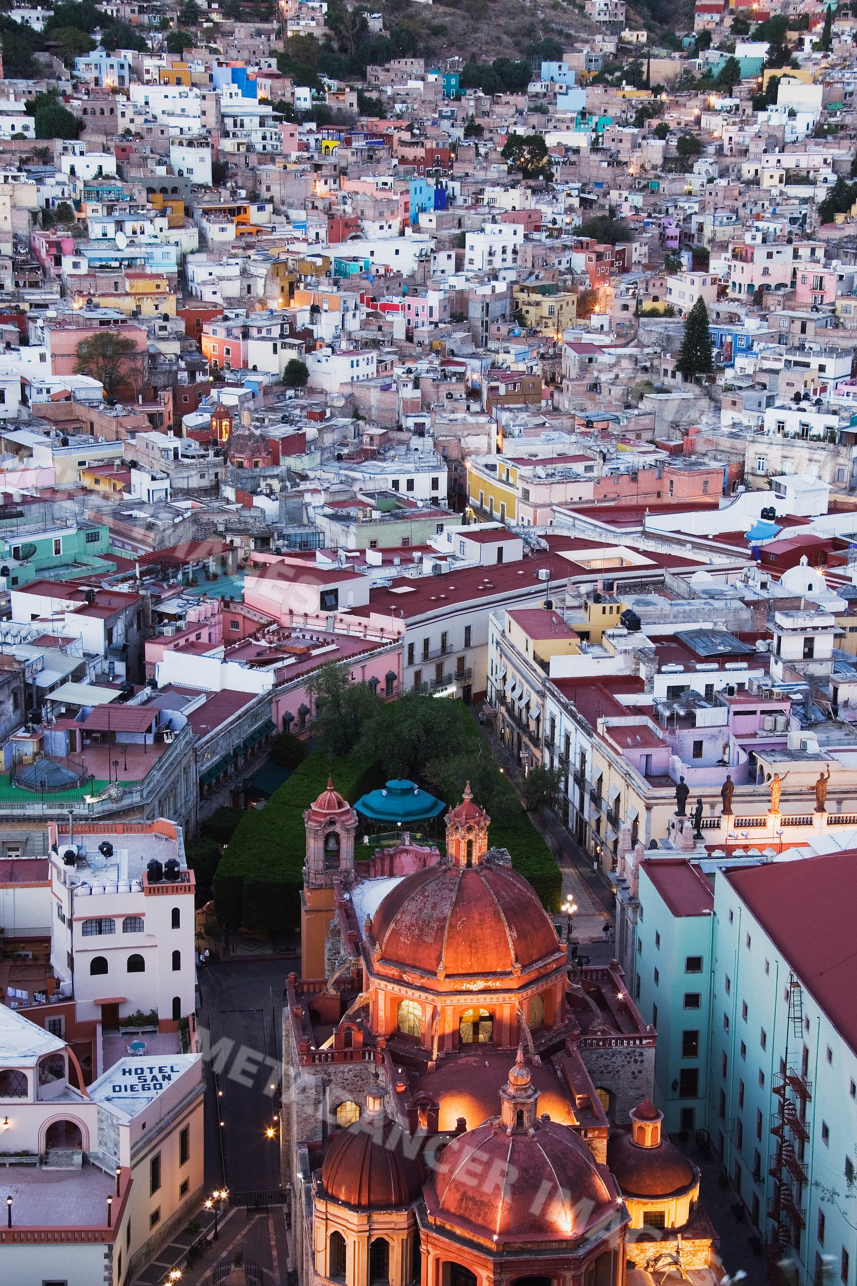 Cityscape with historic church domes, mexico at dusk