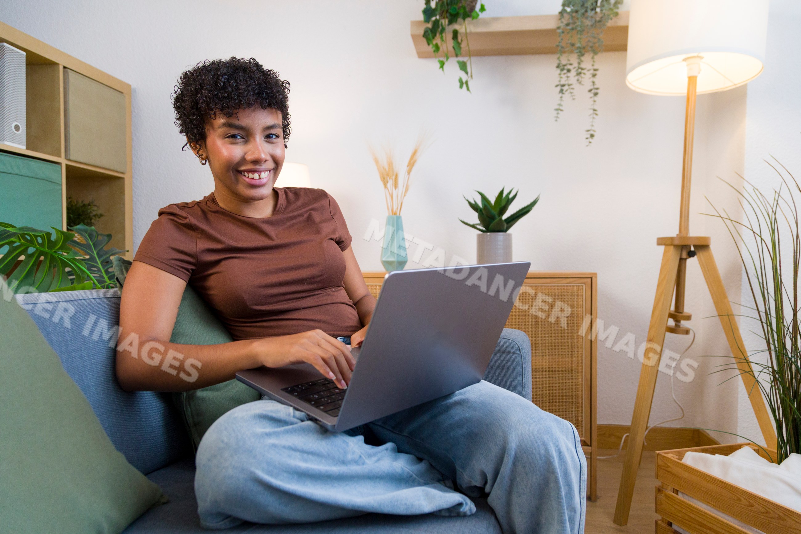 African American woman using laptop