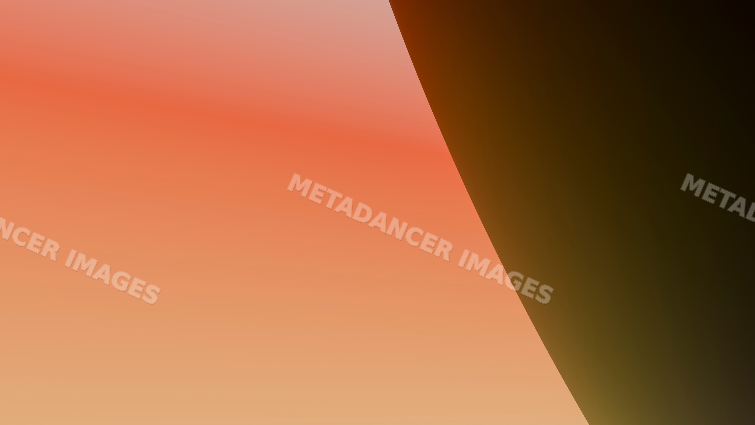 Sunset sky with warm orange colors and silhouette