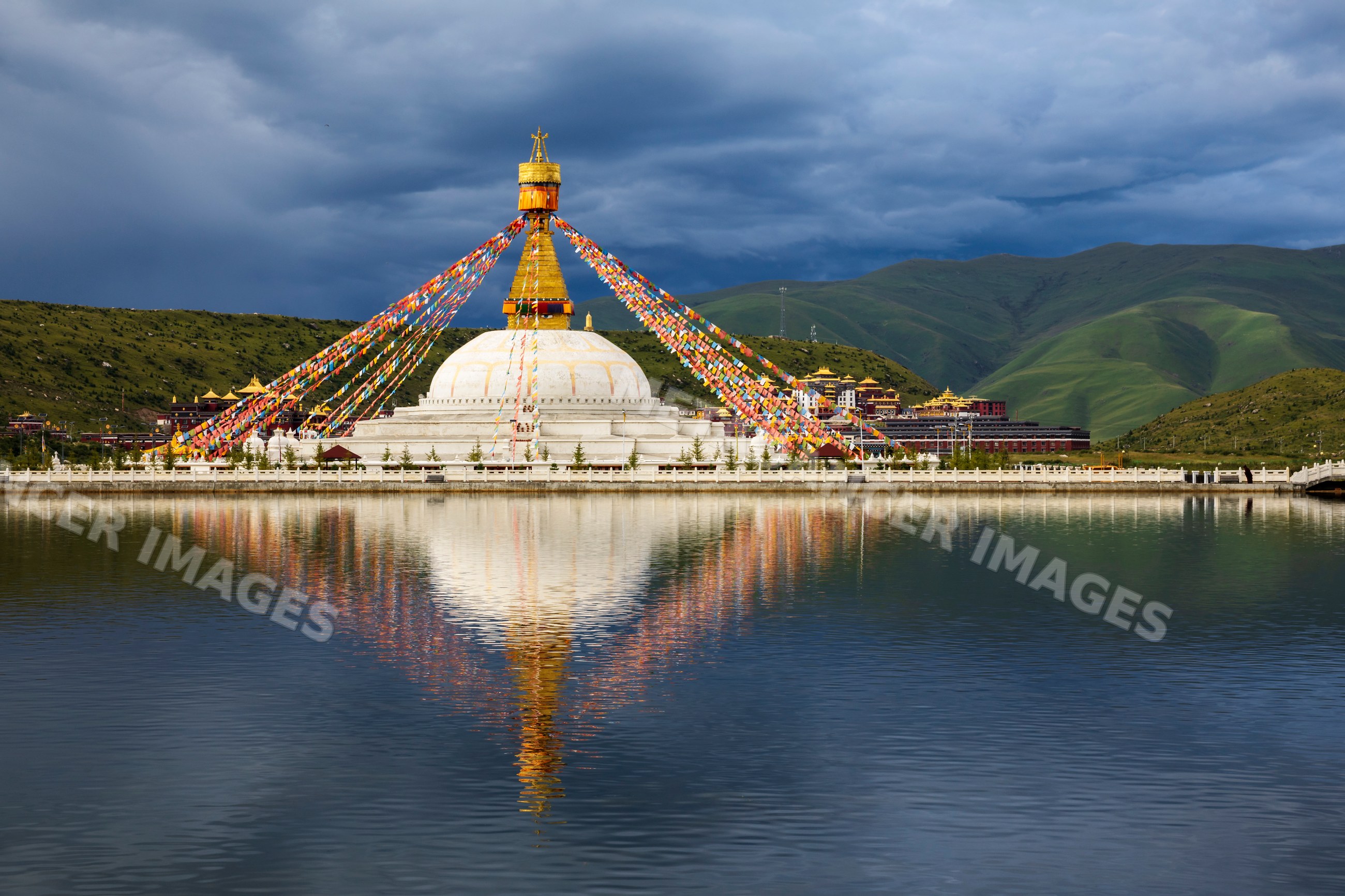 Stupa at Zhuqing Wujian Zen Forest Monastery with prayer flags
