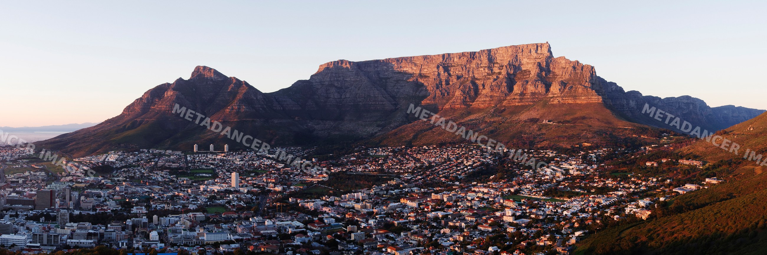 Table mountain overlooking cape town south africa at sunset