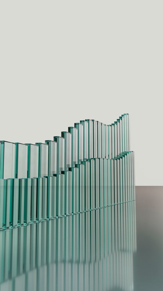 Stacked transparent glass blocks reflecting on smooth surface