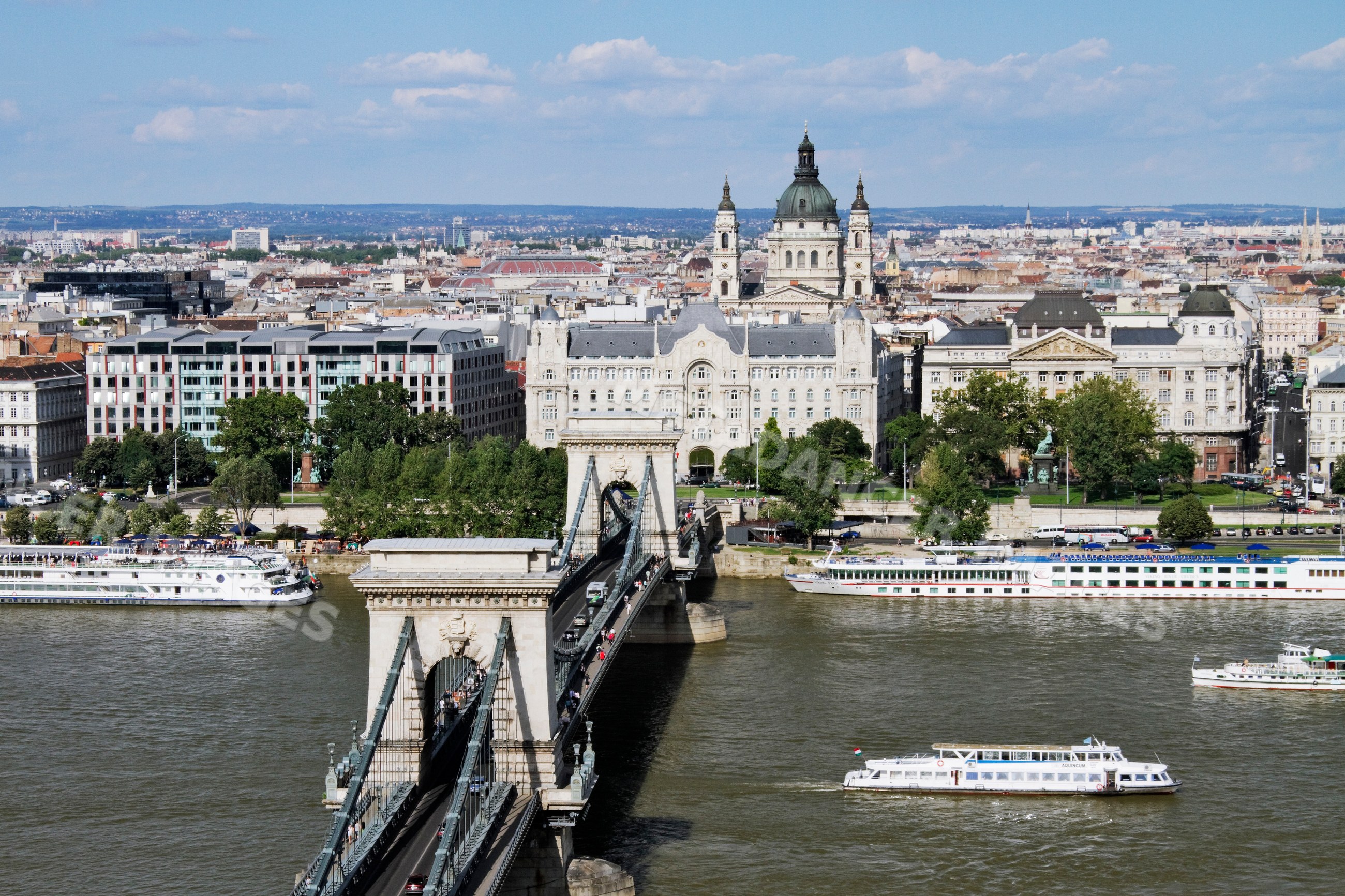 Chain bridge over river danube with budapest cityscape