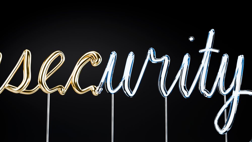 Metallic wire security sign on black background