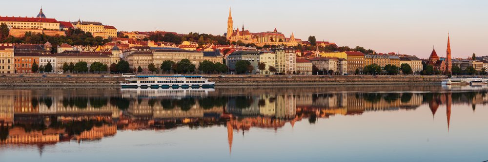 View of Buda at Dawn with river reflections