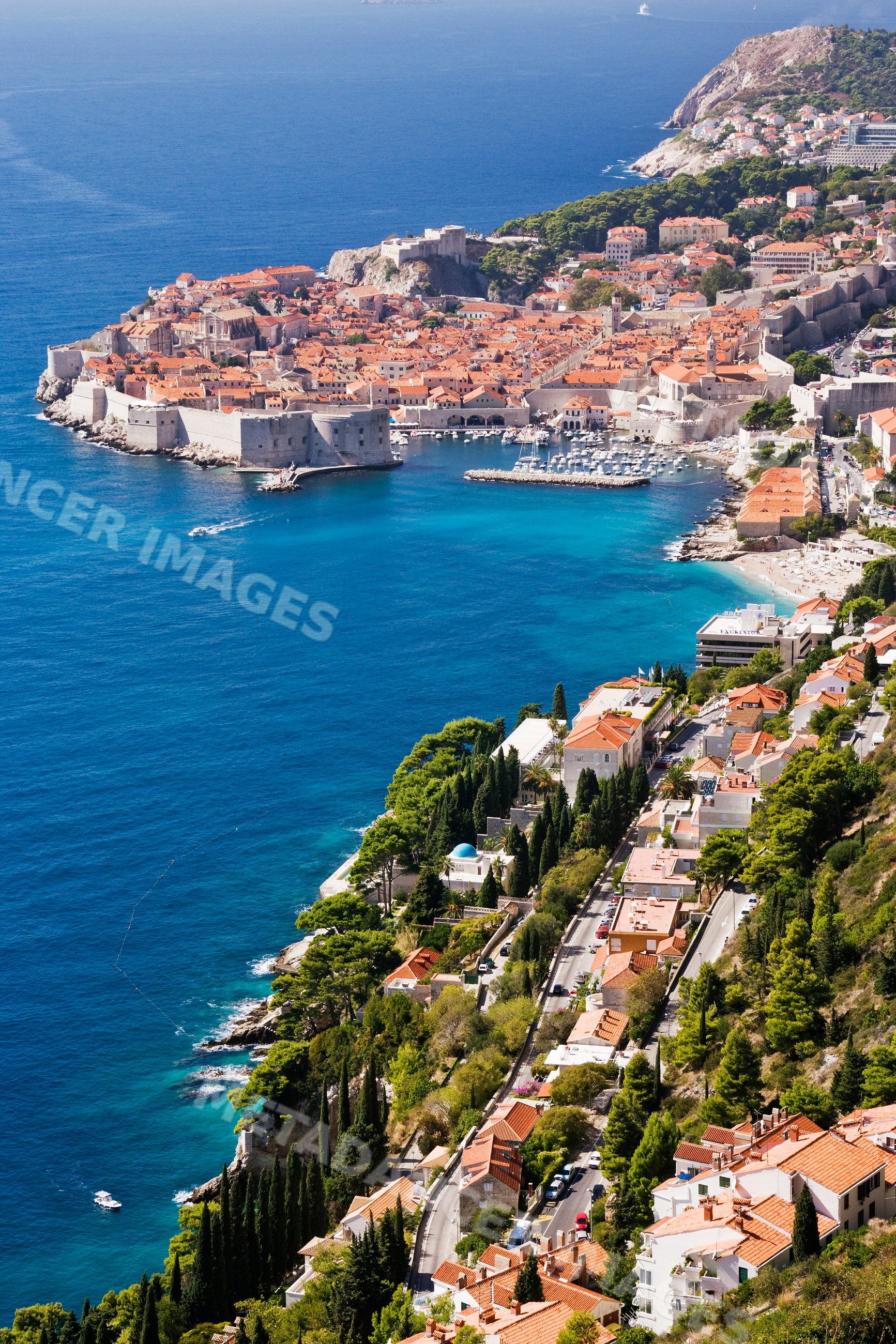 Old city of dubrovnik with fortified walls on adriatic sea coast