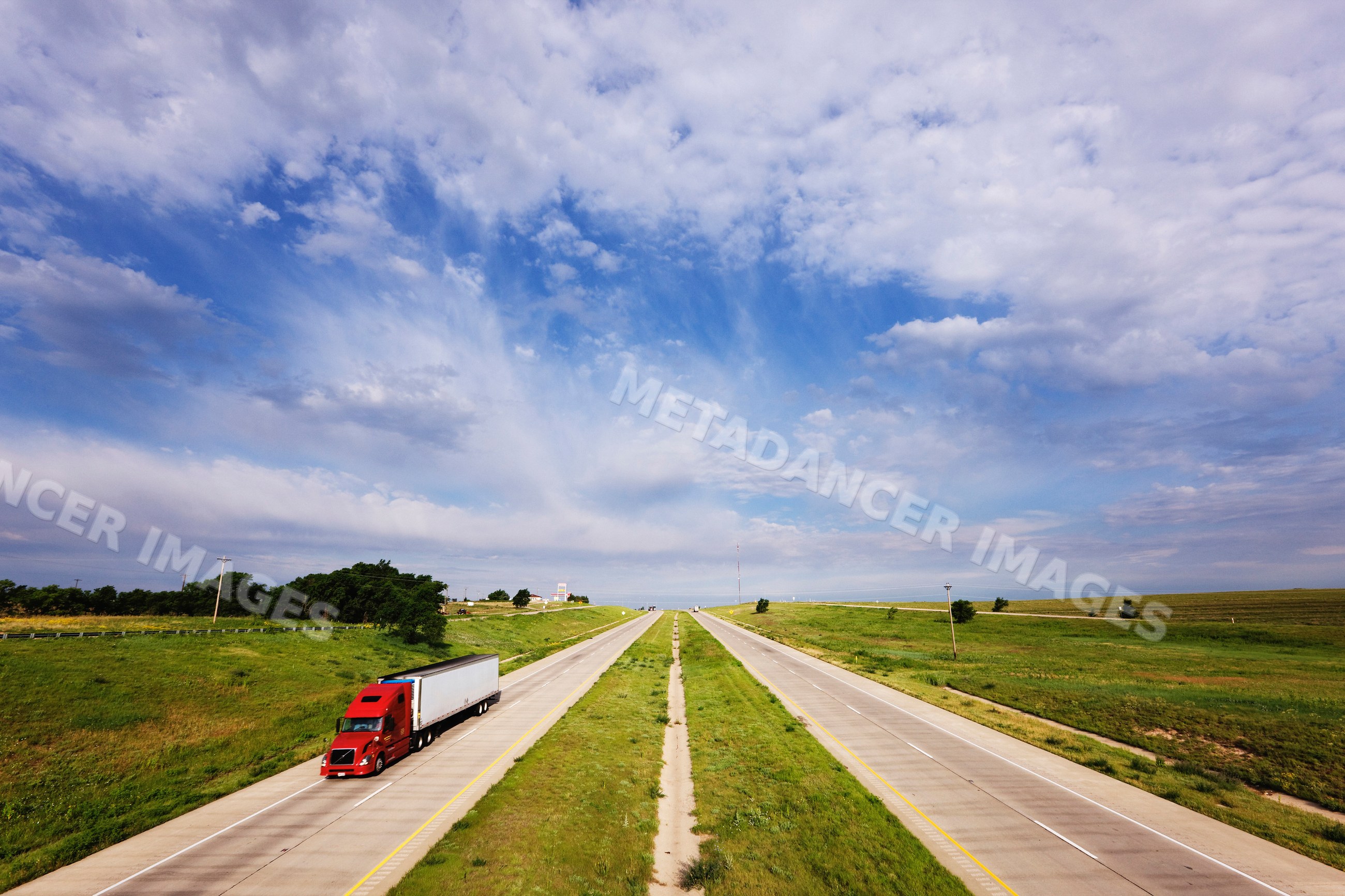 Semi truck driving on interstate 40 highway USA