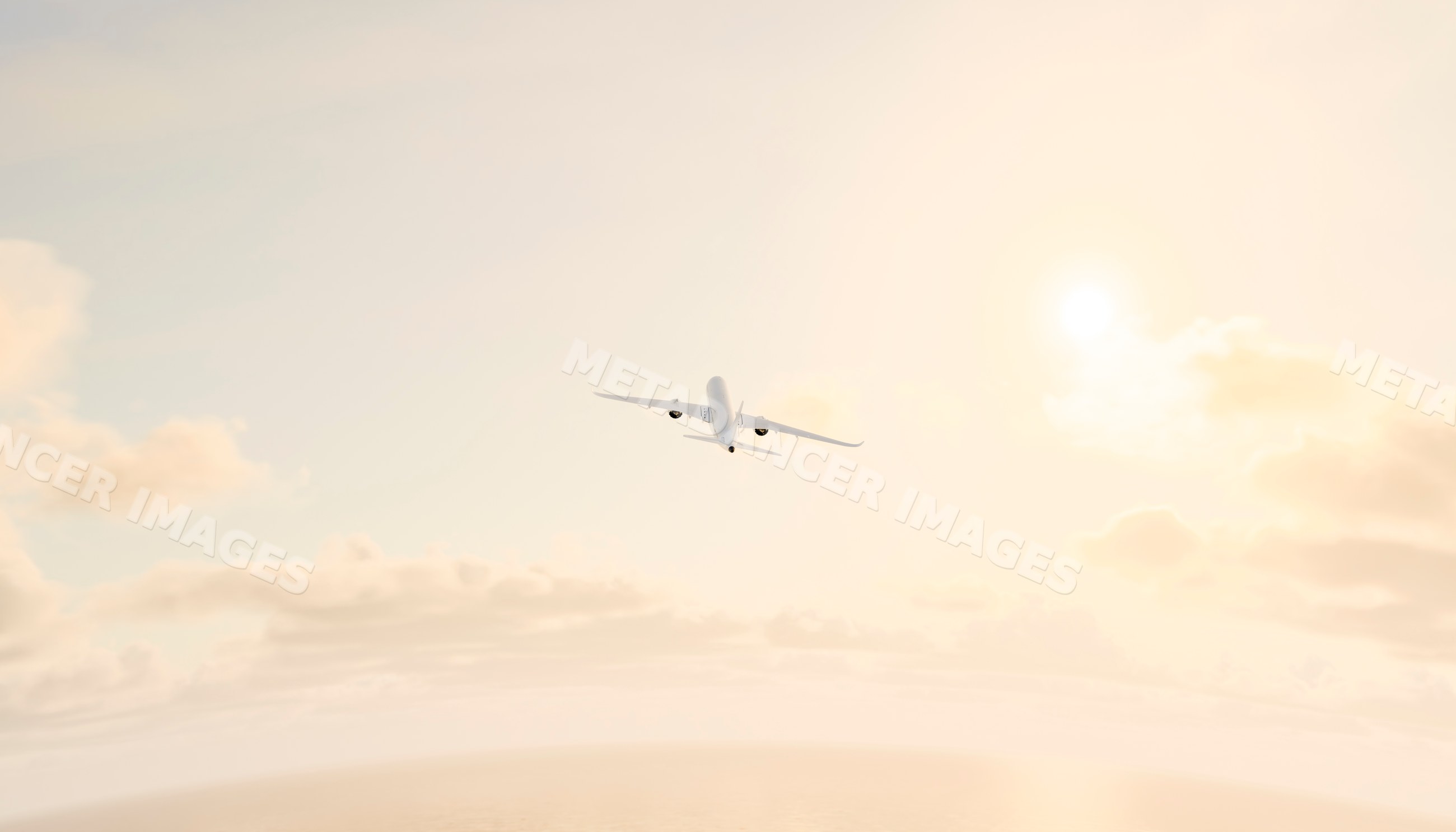 A commercial airplane is flying upward in a sunny sky with clouds
