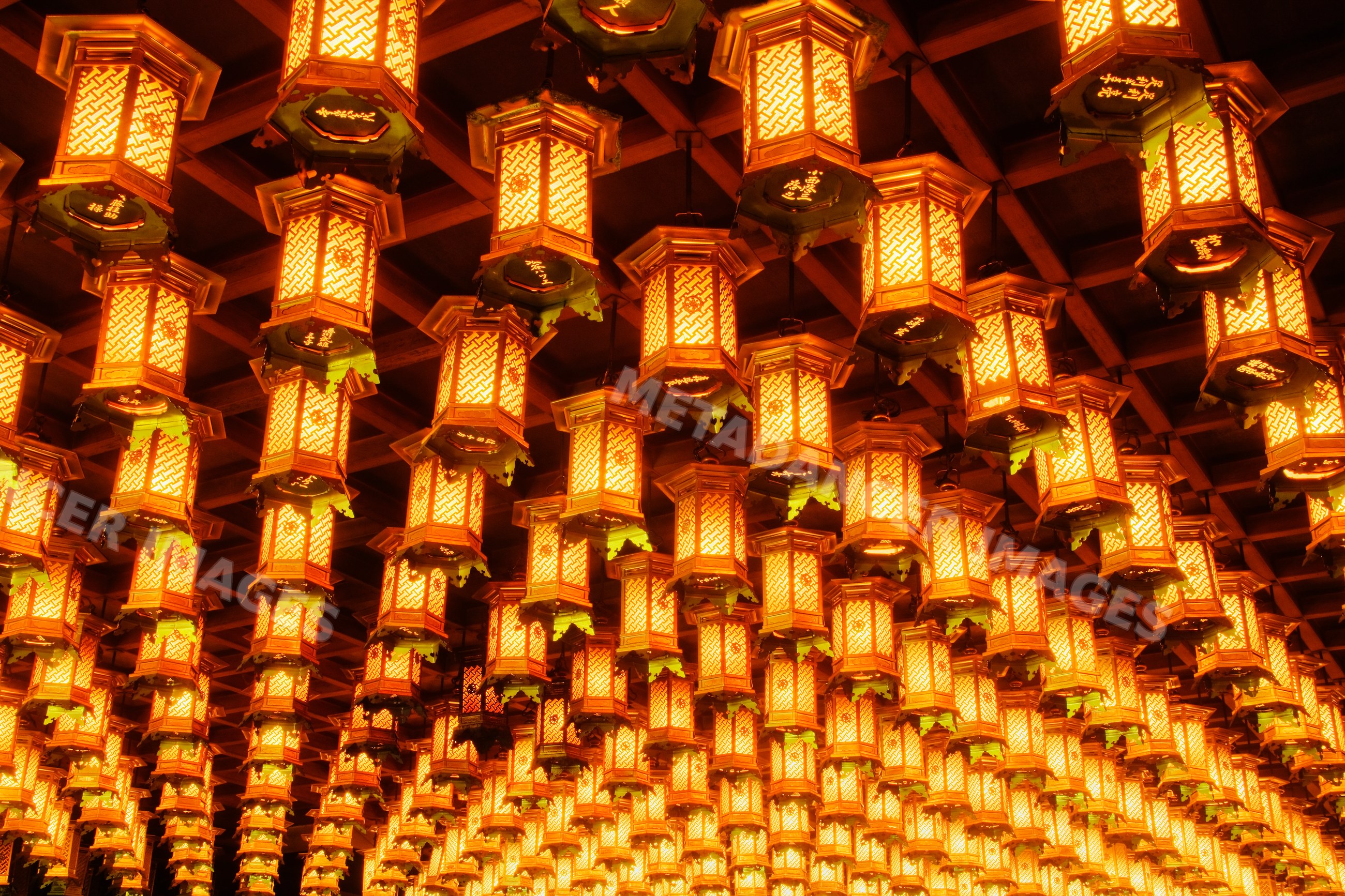 Lanterns hanging at hakkaku manpuku hall in daisho-in temple