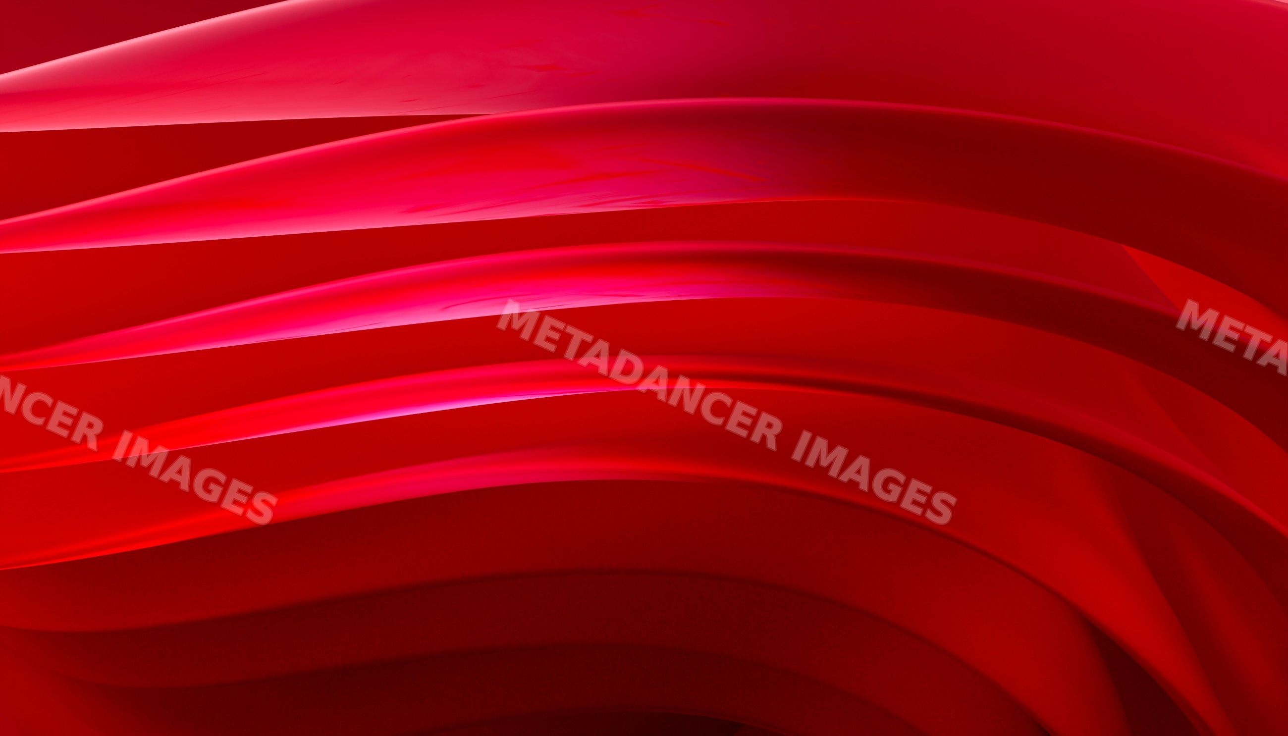 Close-up of flowing red fabric with curved layers forming abstract