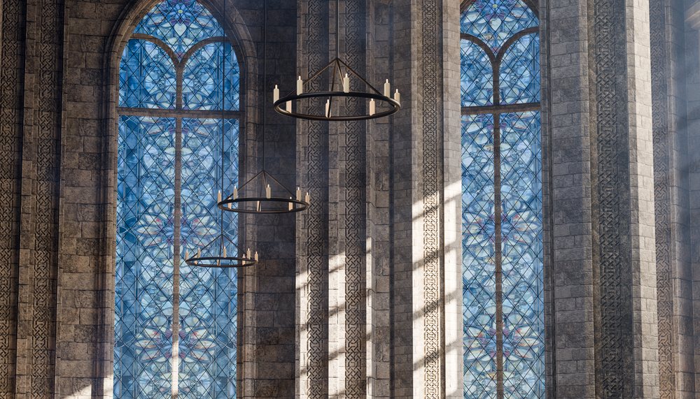 Gothic church interior with blue stained glass windows and candle