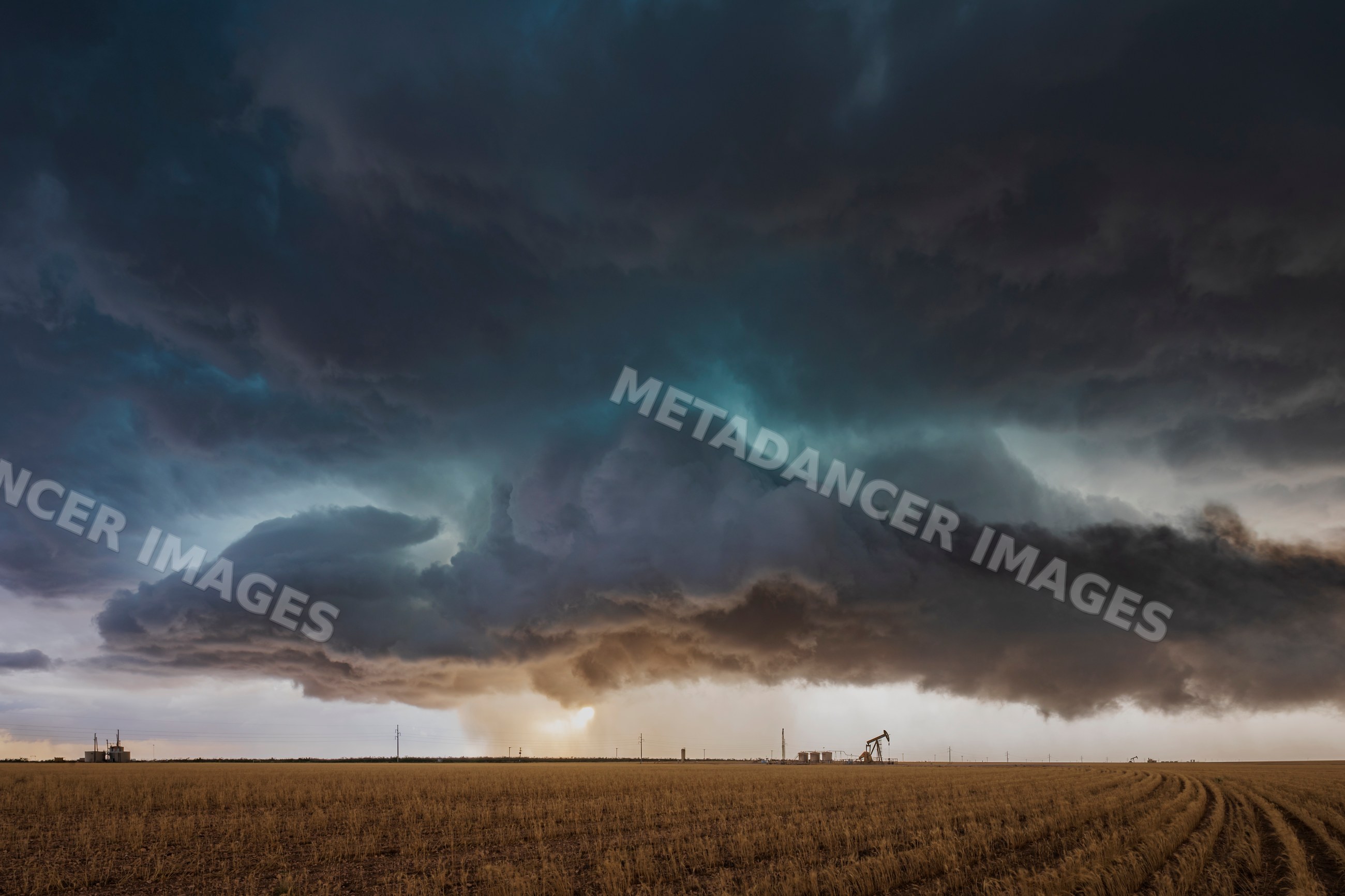Severe-Warned Supercell storm over field near garden city texas