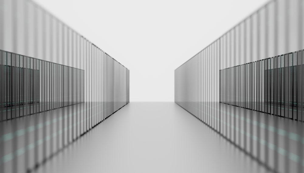 Empty aisle between server racks in a modern technology facility