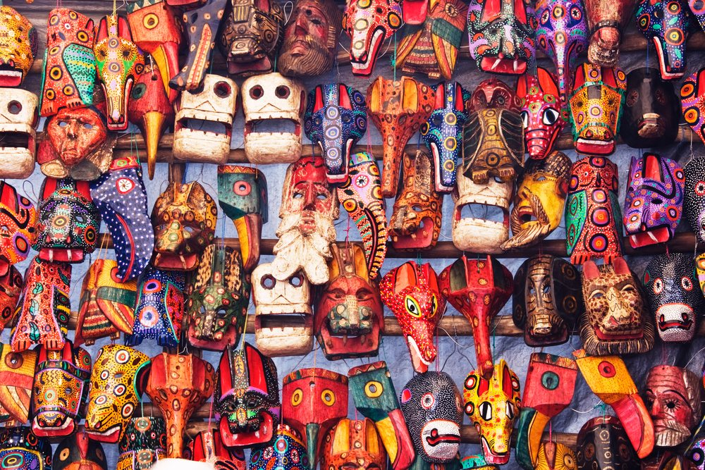 Colorful wooden masks displayed