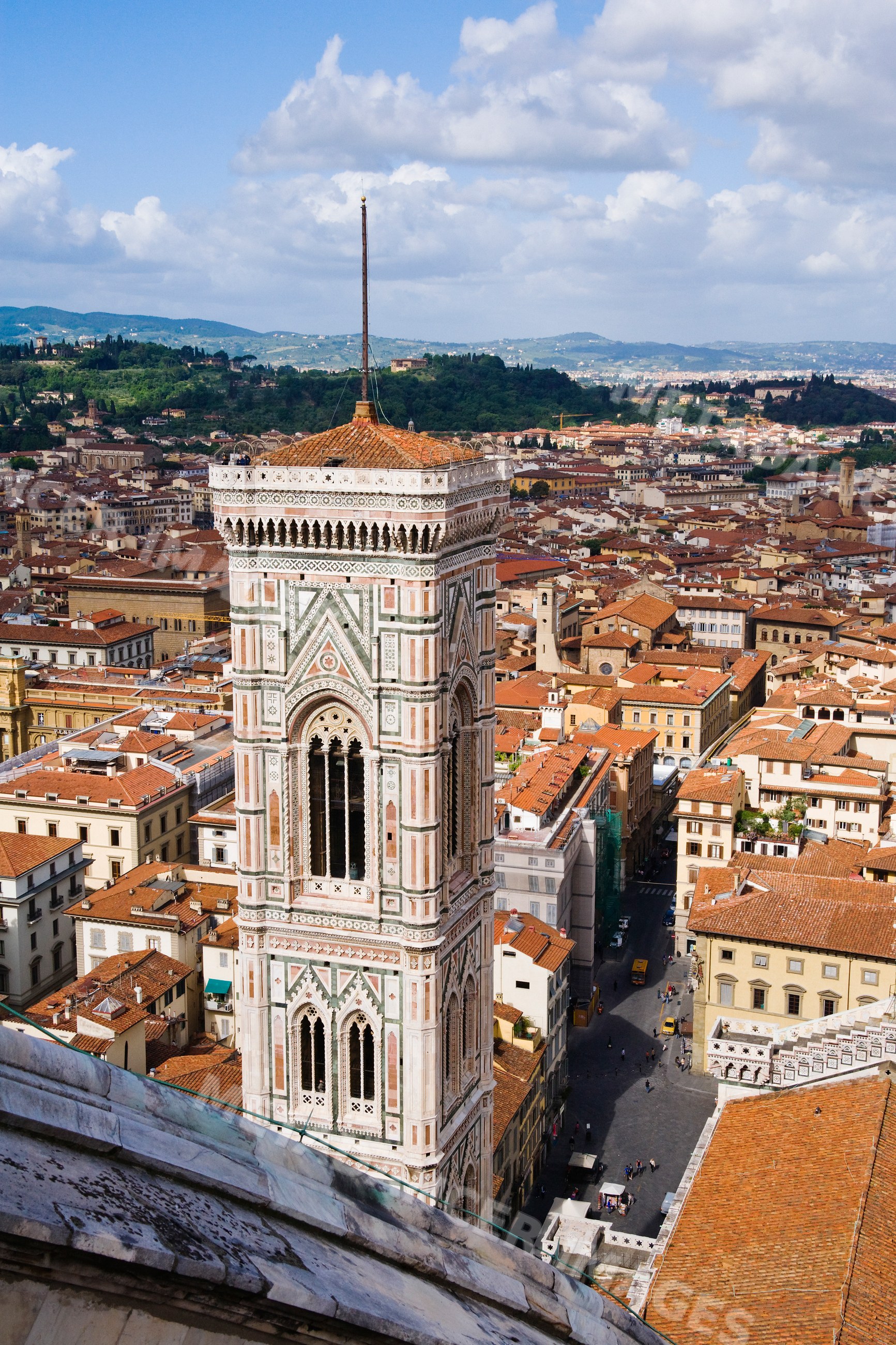 Campanile cathedral tower overlooking florence cityscape