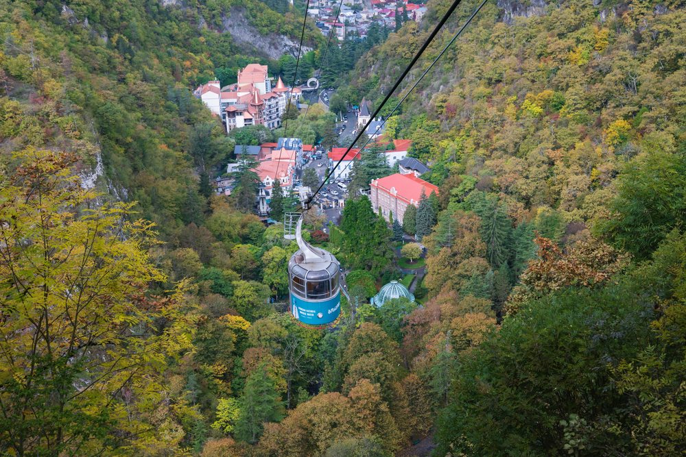 Borjomi Cable Car traveling over autumn forest valley