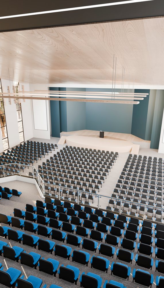 Conference hall with stage and blue seating