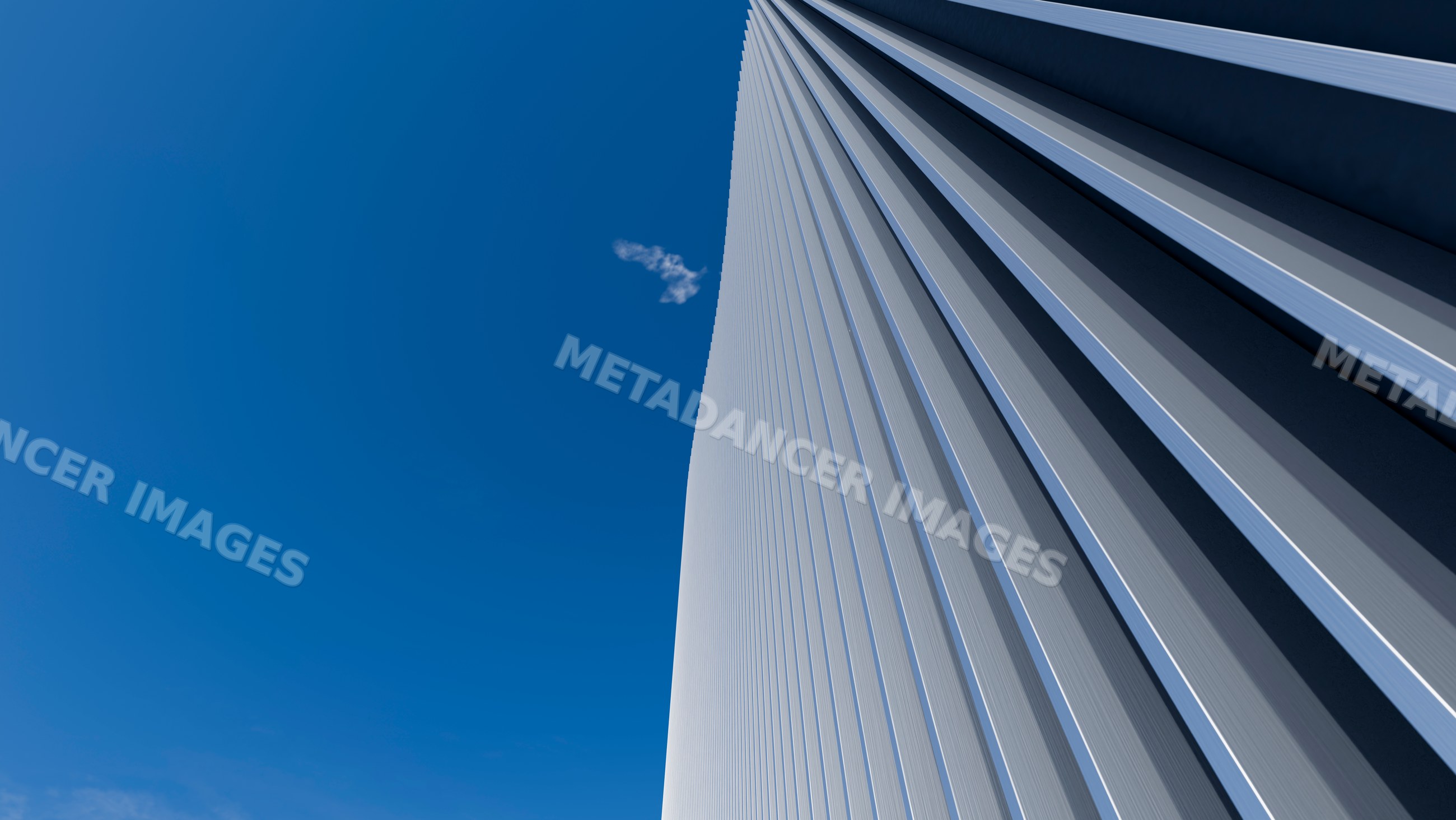 Modern skyscraper with steel facade under blue sky