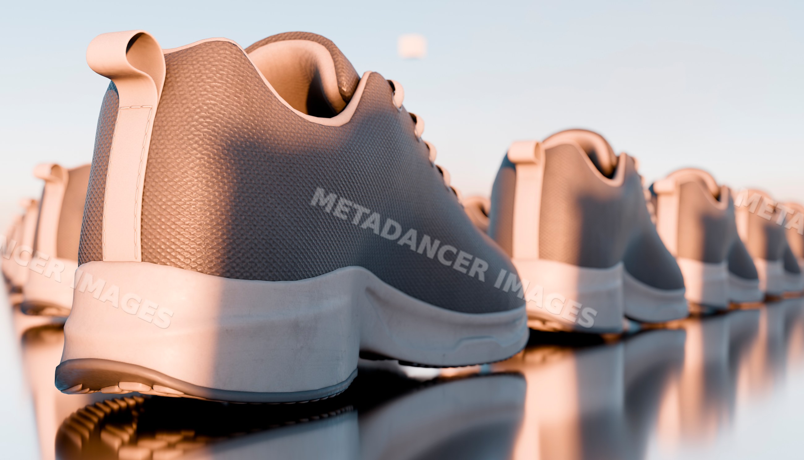 Athletic shoes lined up in a row with reflective surface in studio