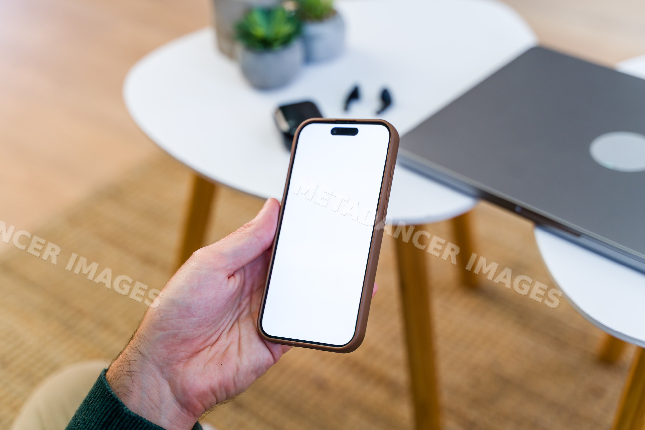 Smartphone held by left hand