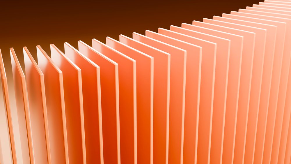 Orange 3d panels arranged in repetitive rows in an abstract design