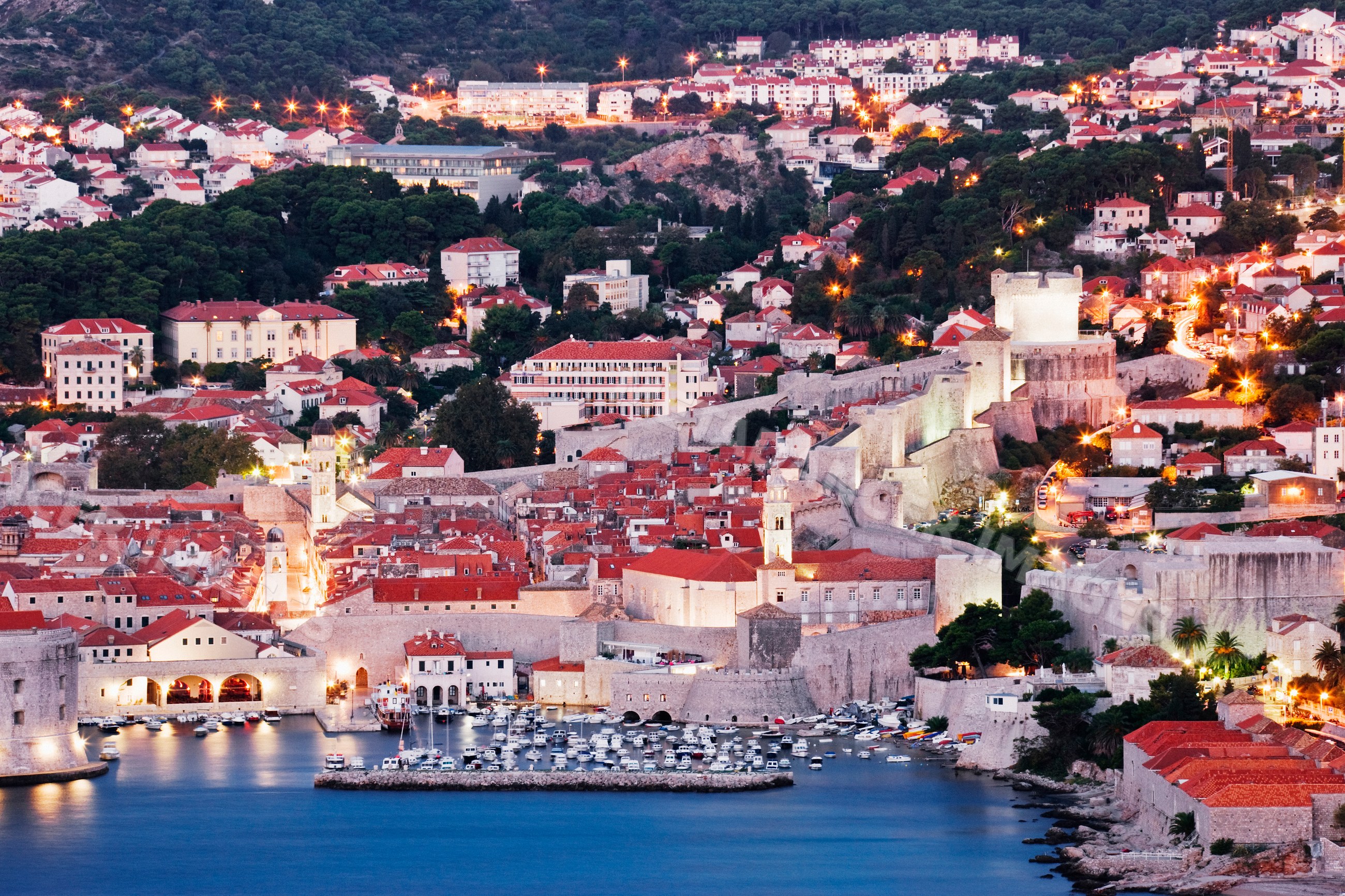 Old city of dubrovnik at dawn with medieval walls and harbor