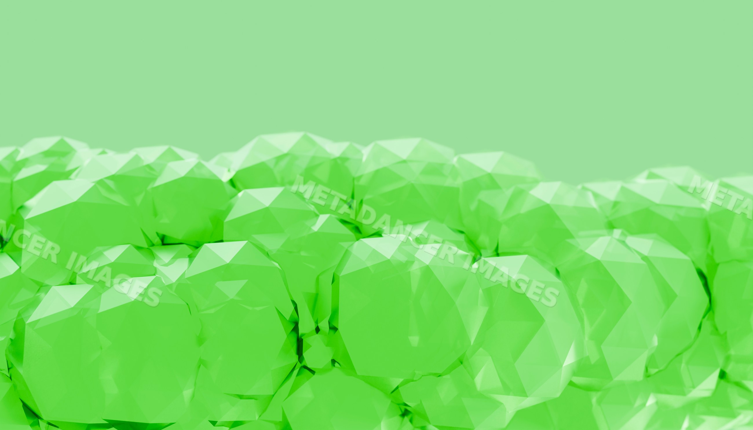 Cluster of green faceted crystals with shiny gemstone texture