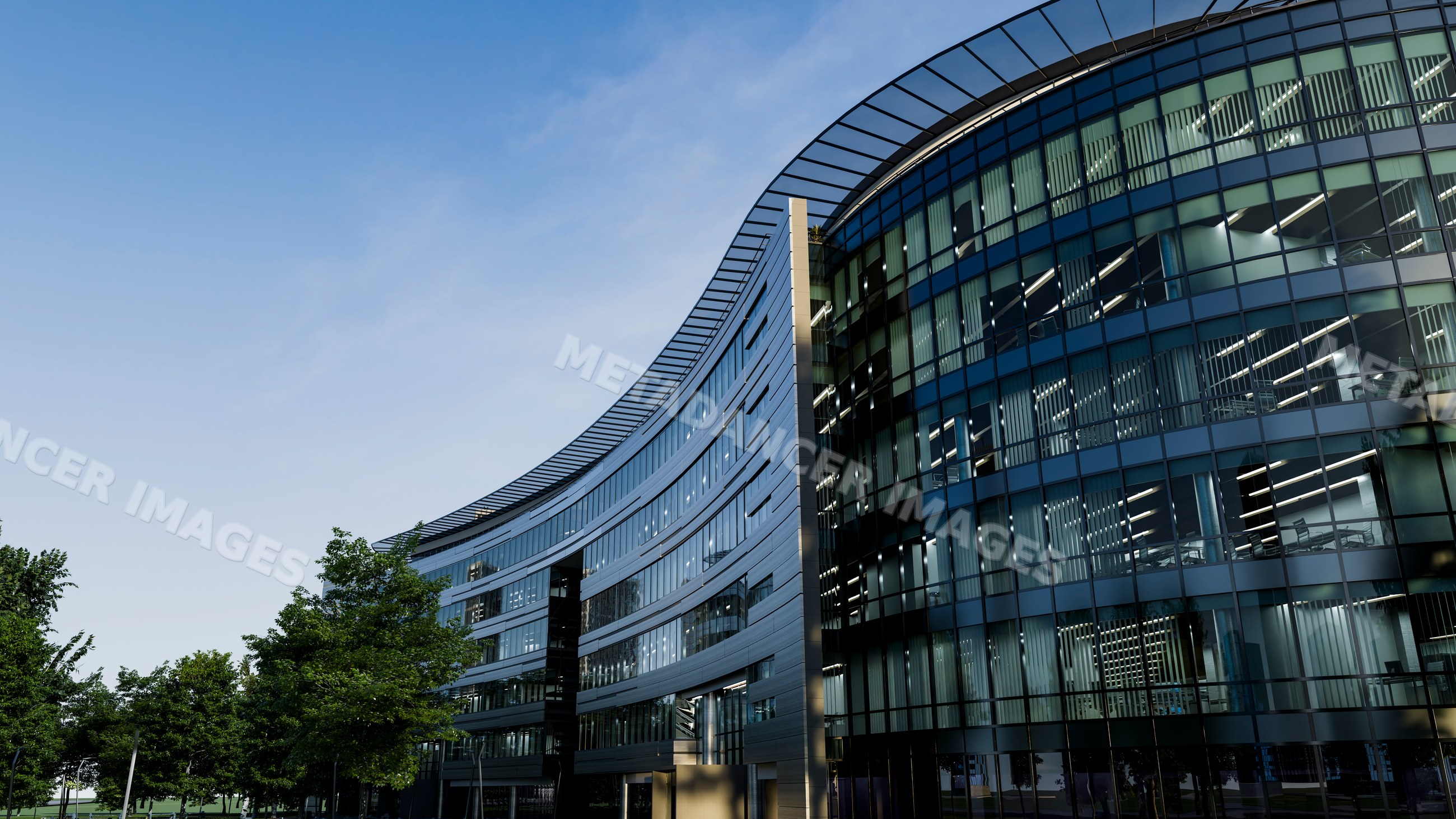 Modern office building with curved glass facade and trees