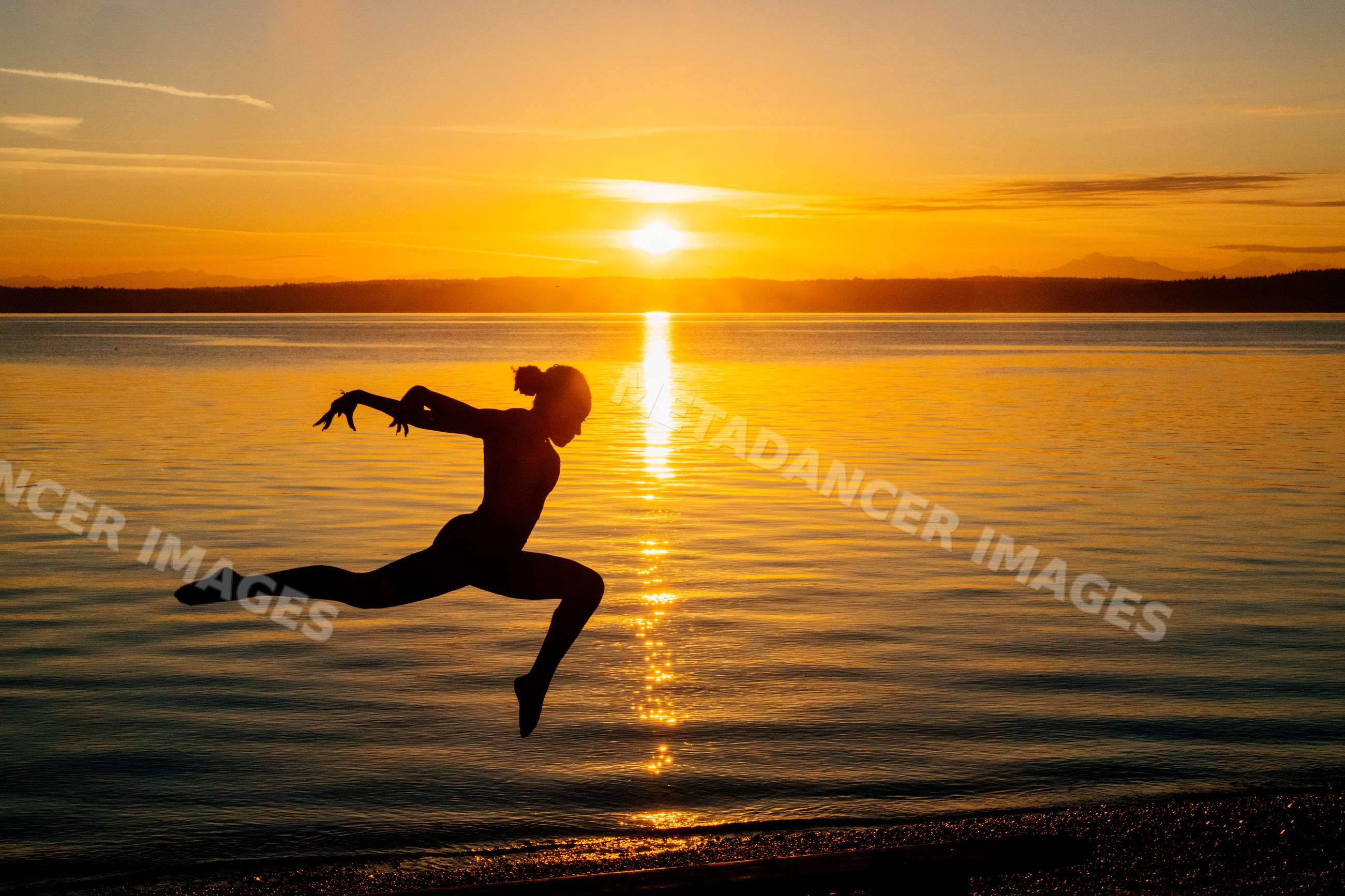 Silhouette of a Hispanic person performing an acrobatic jump