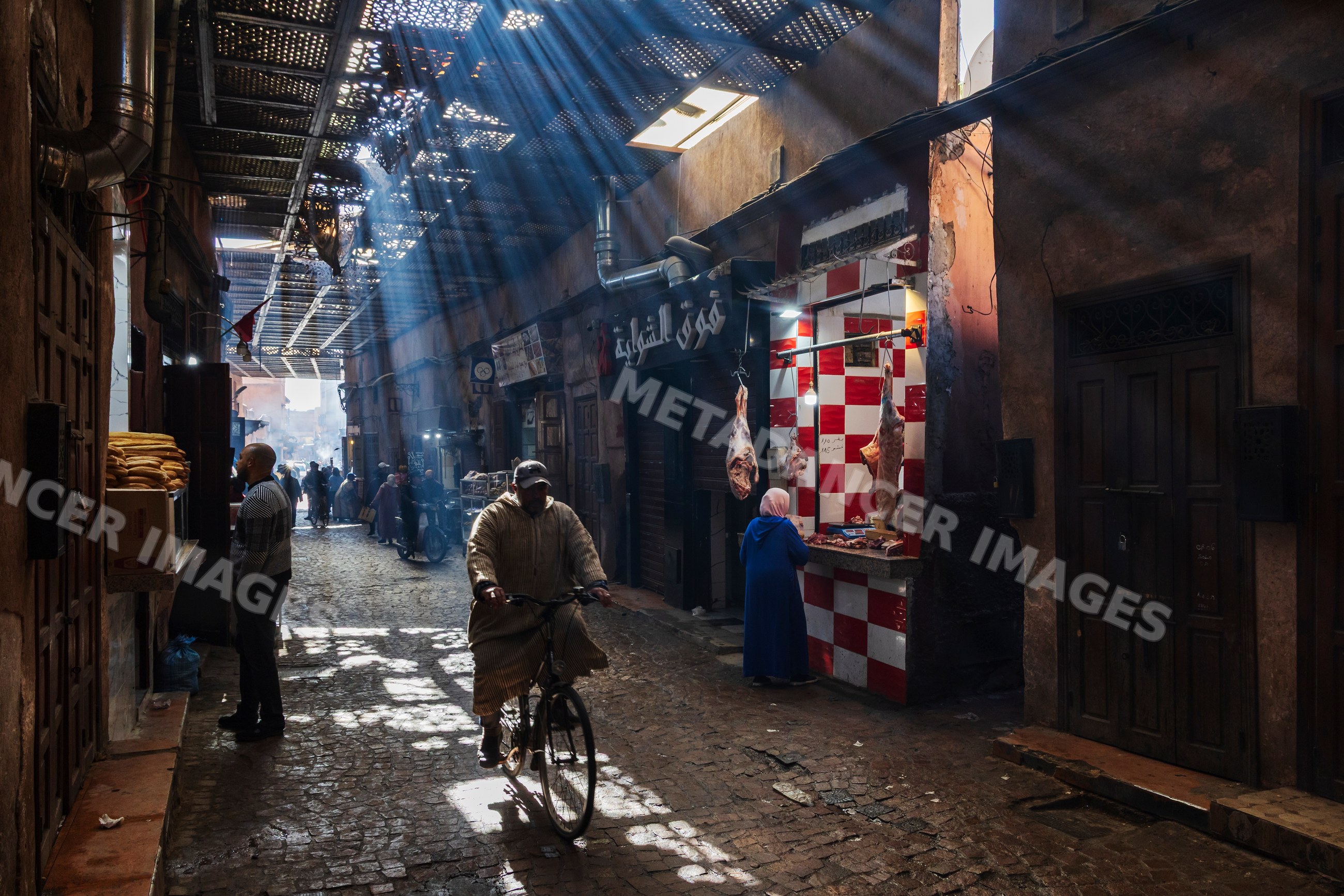 Light Rays illuminating souq street in marrakech Morocco