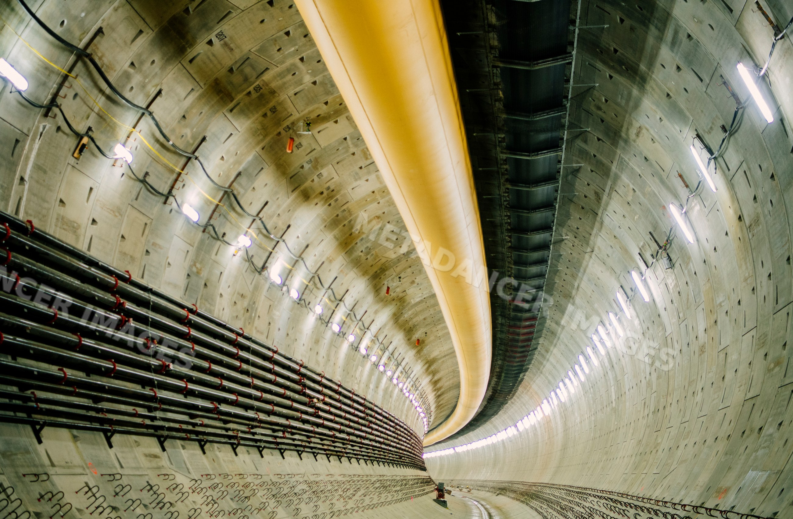 Large curved concrete tunnel under construction