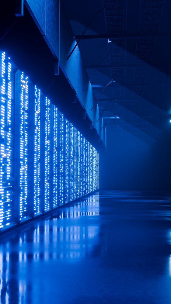 Led light panels illuminating an industrial corridor with reflective