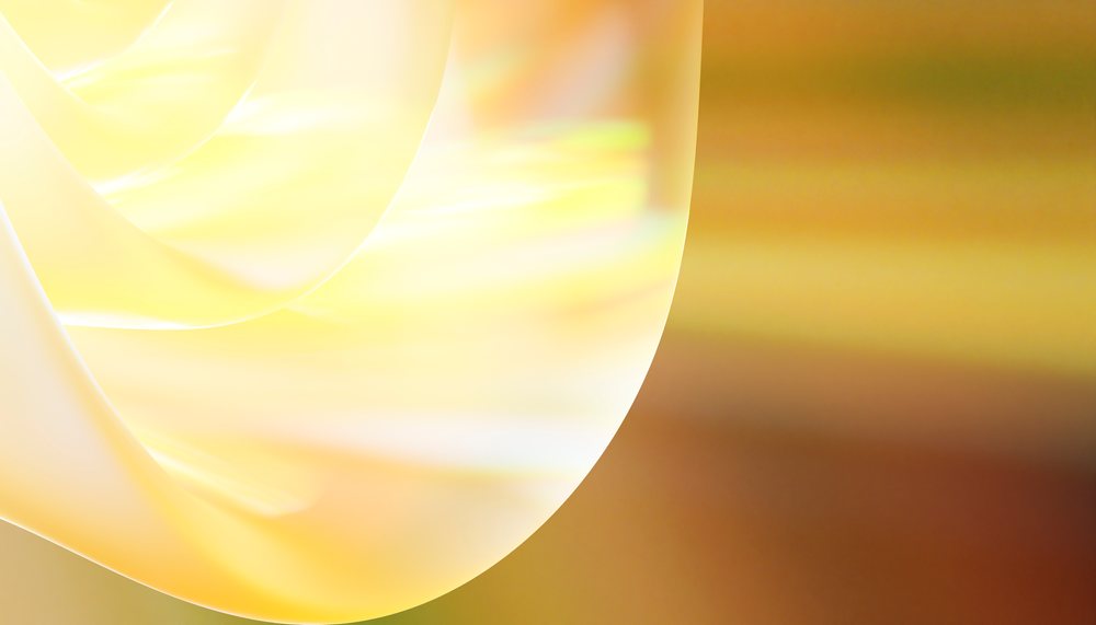 Abstract image of soft glowing yellow and golden curved shapes