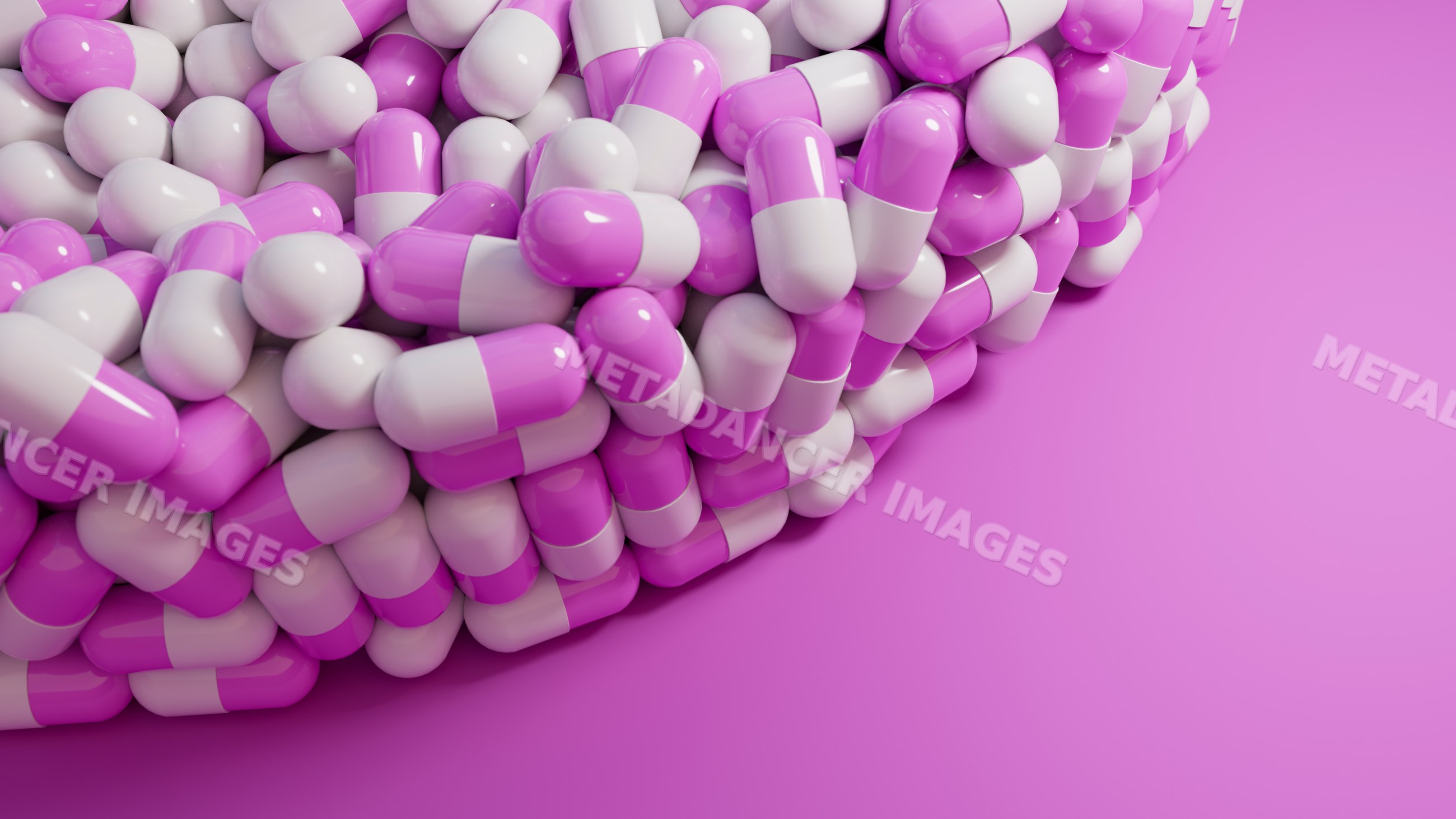 Pile of pink and white capsule pills on pink background