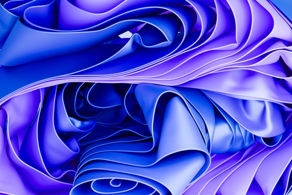 3d rendered abstract blue and purple folds forming a dynamic