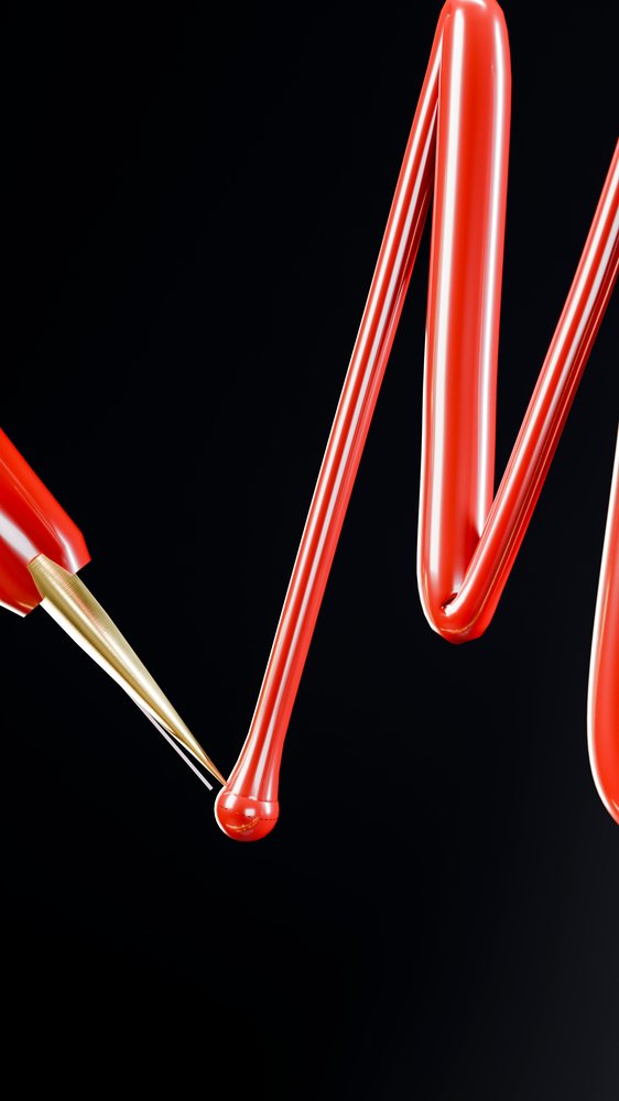 Gold-tipped paintbrush dripping red paint