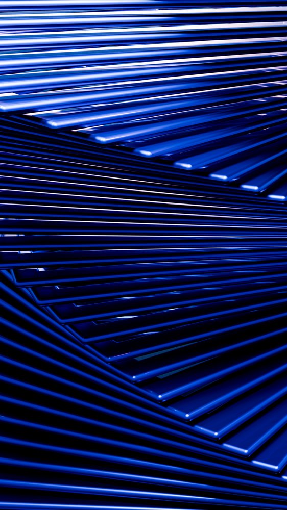 Stacked blue metal sheets with parallel angled arrangement