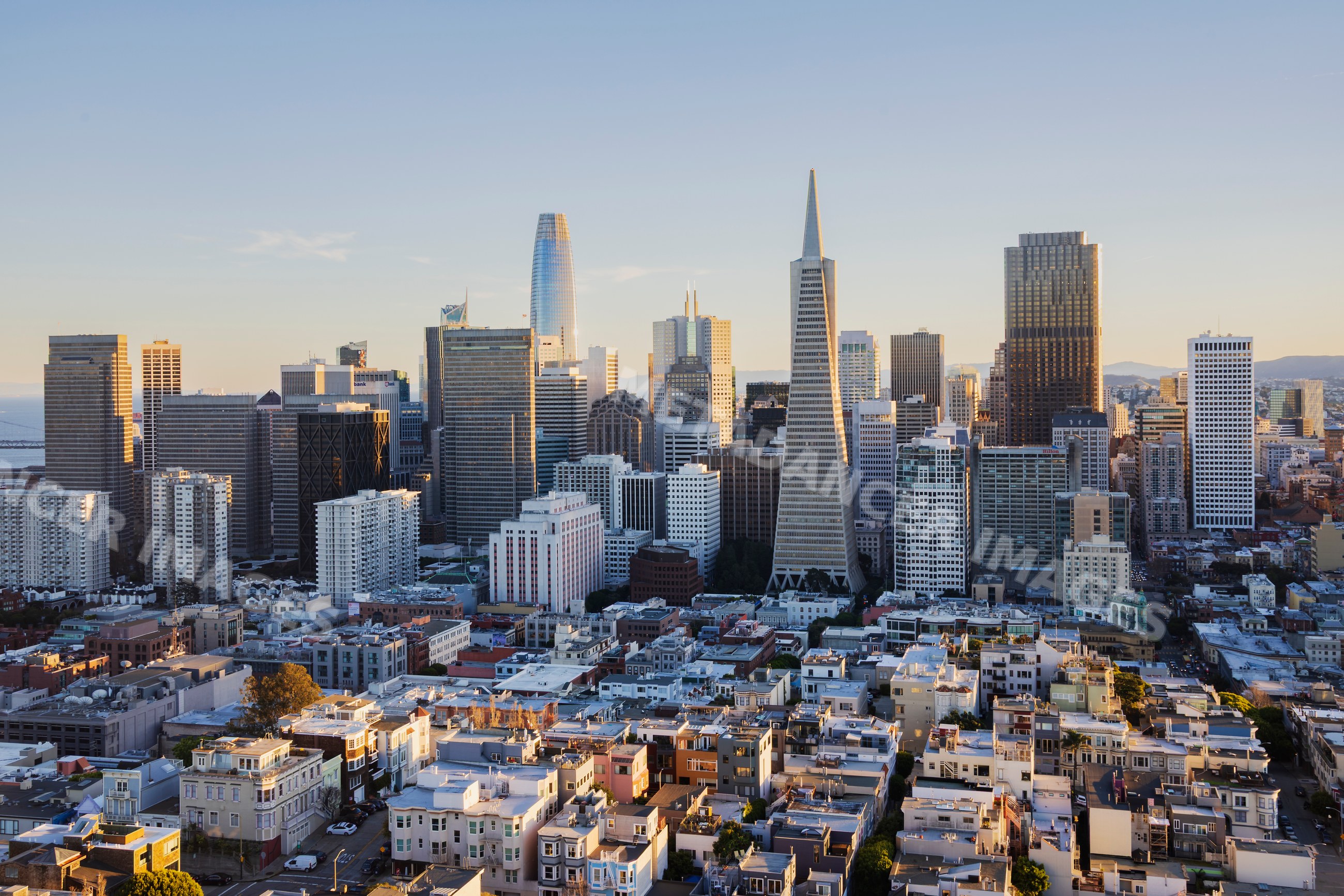 Sunset view of downtown San Francisco skyline from Coit Tower