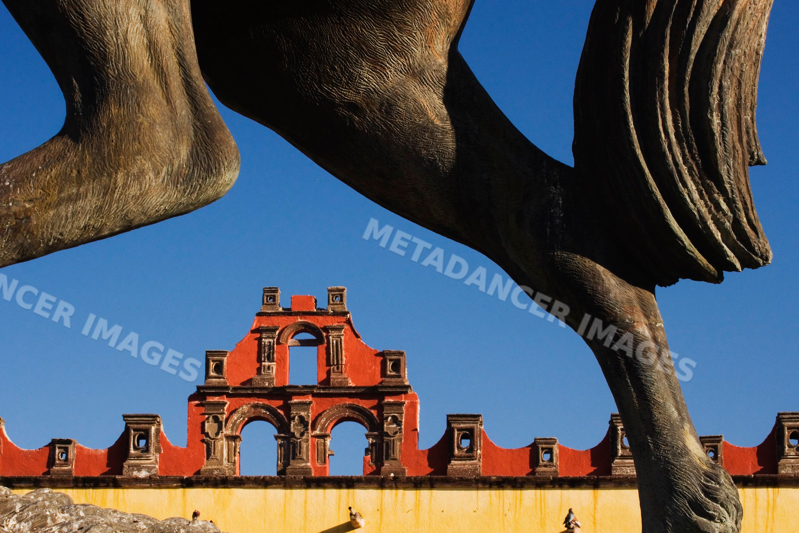 Statue and historic building mexico