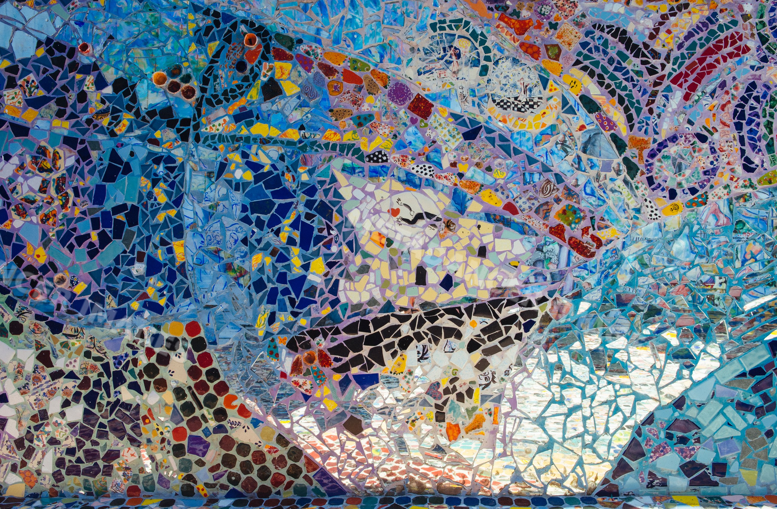 Colorful abstract mosaic artwork with broken tile pieces
