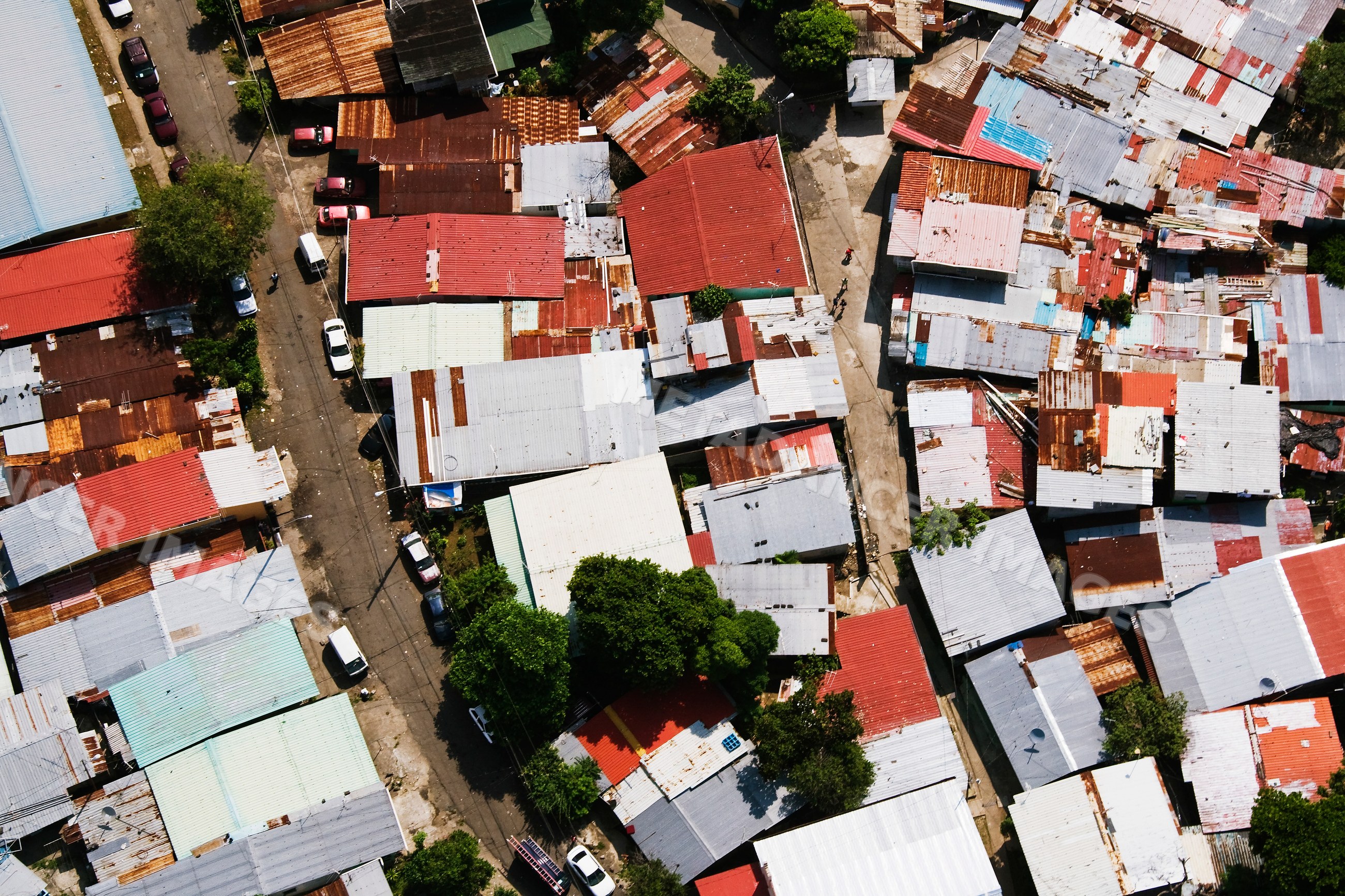 Aerial view of shanty houses with metal roofs