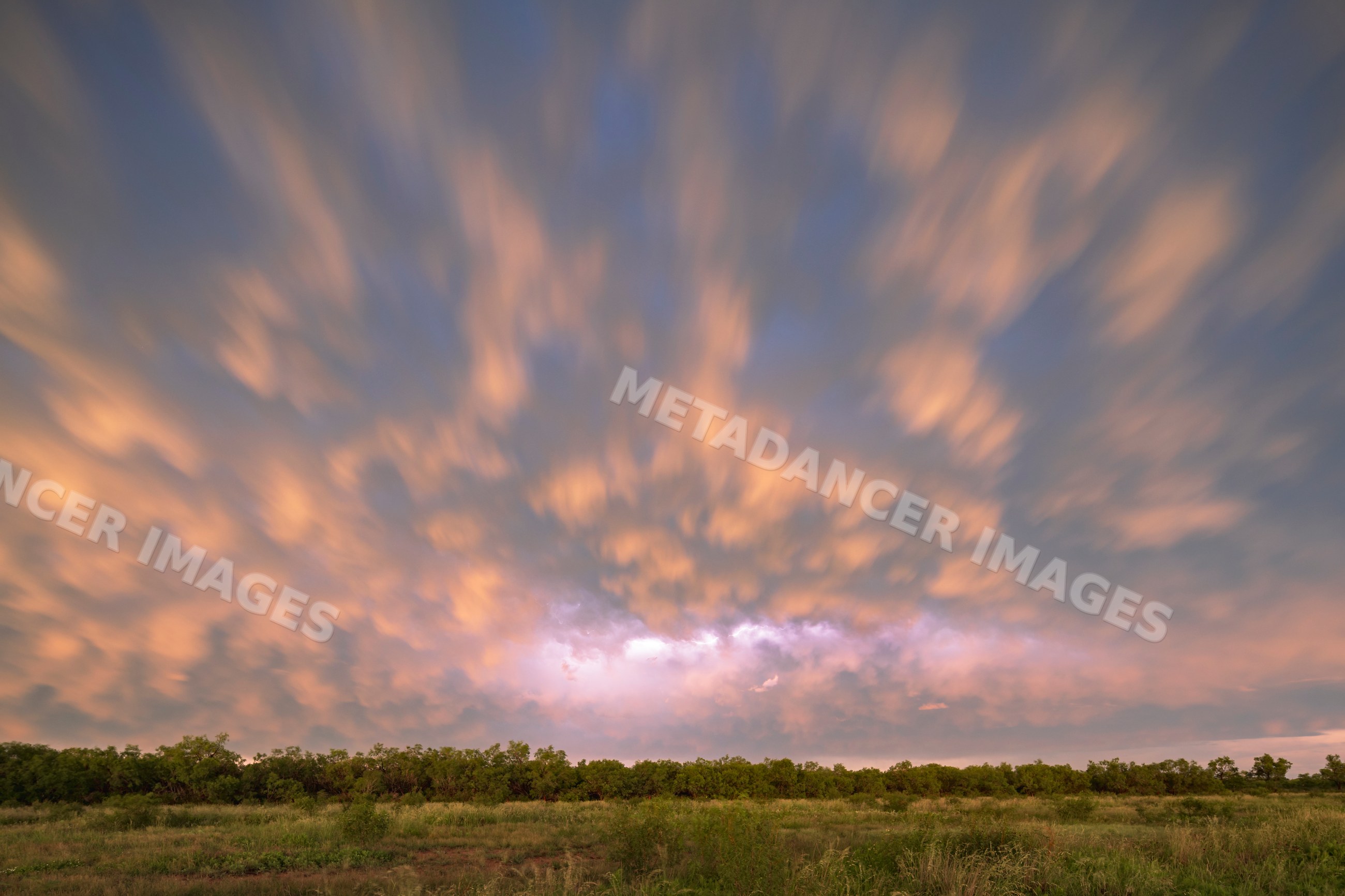 Sunset Lightning on the back side of a Supercell storm in uvalde texas