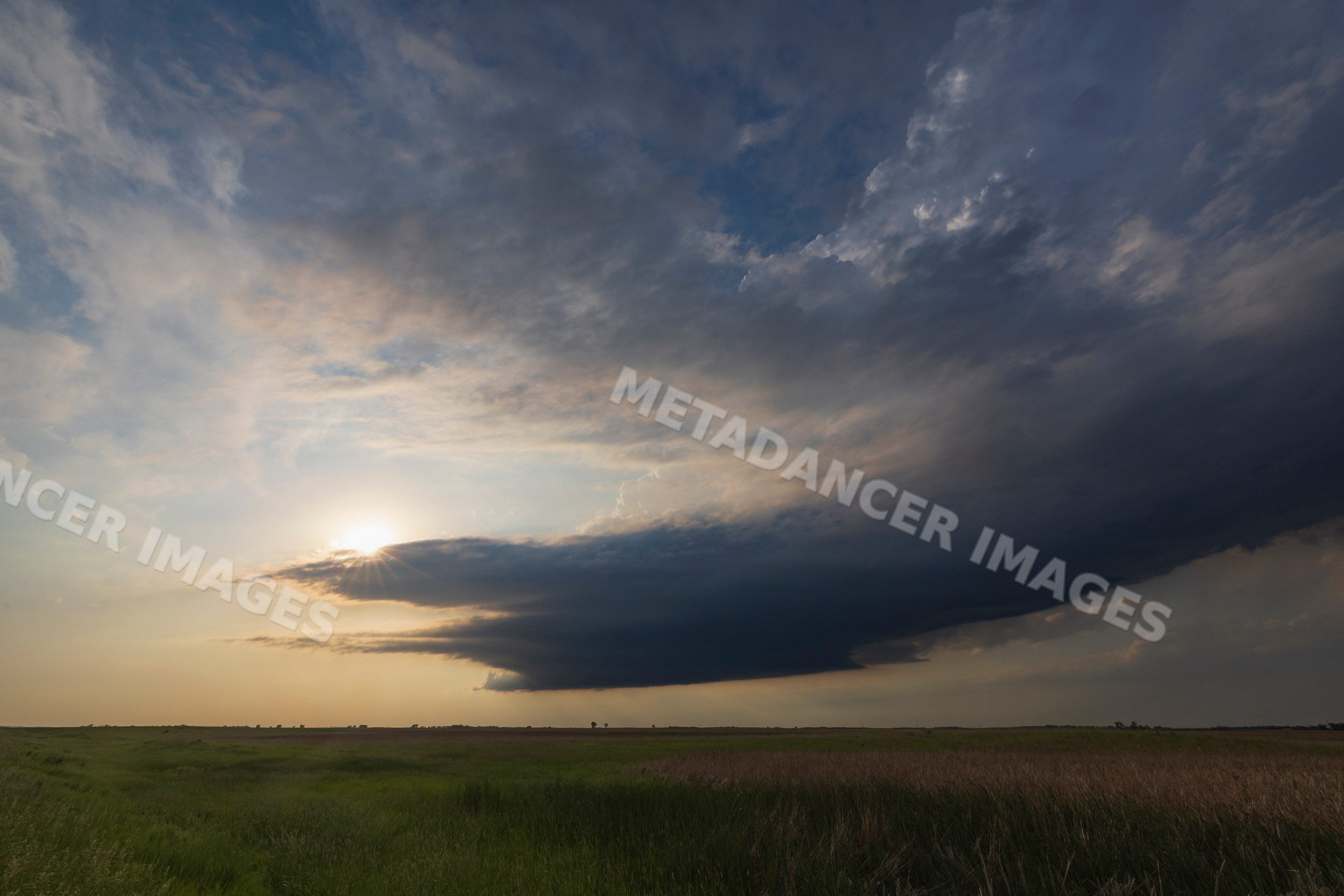 Supercell storm cloud forms over field near montpelier, north dakota