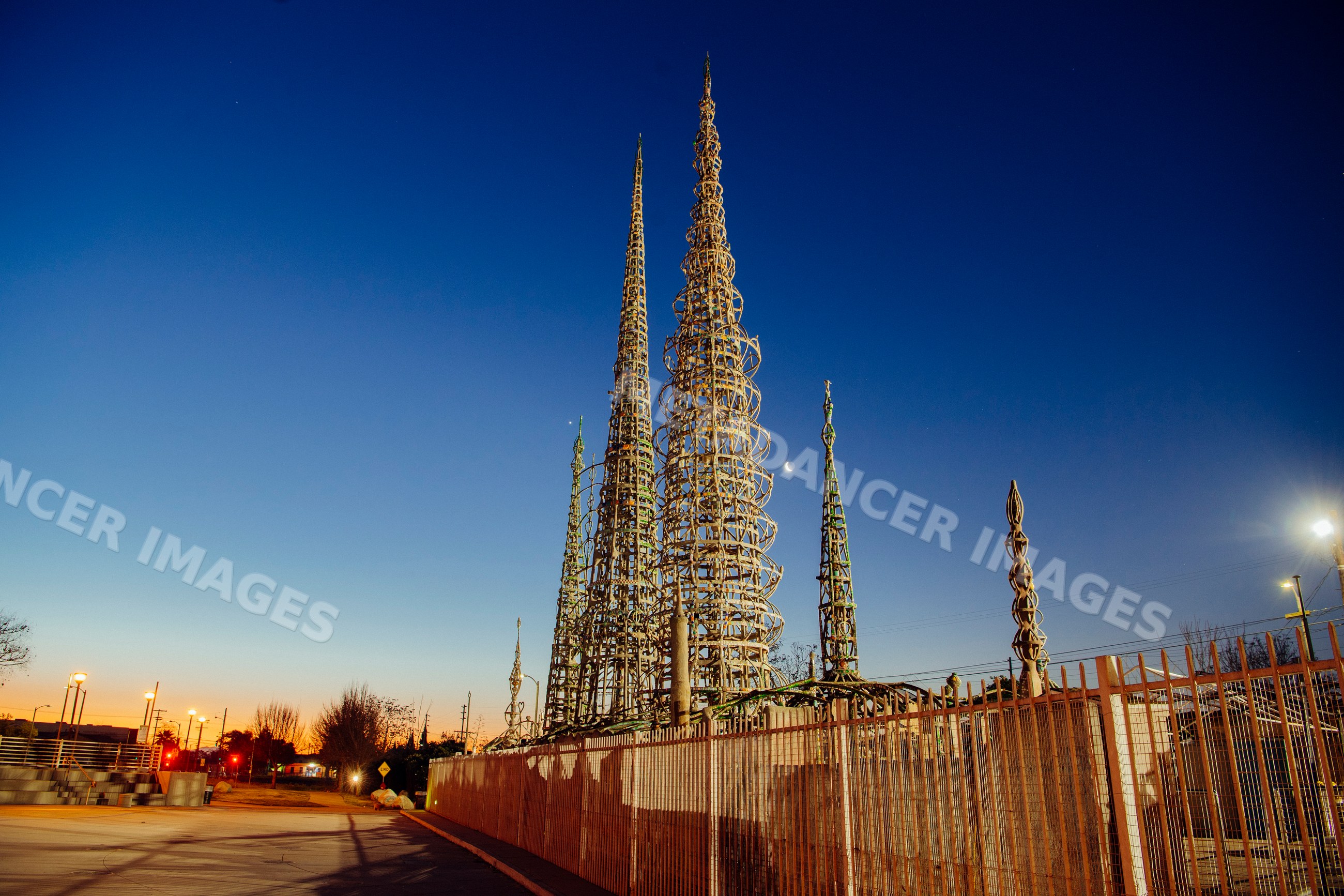 Watts towers steel and wire sculpture at twilight in California