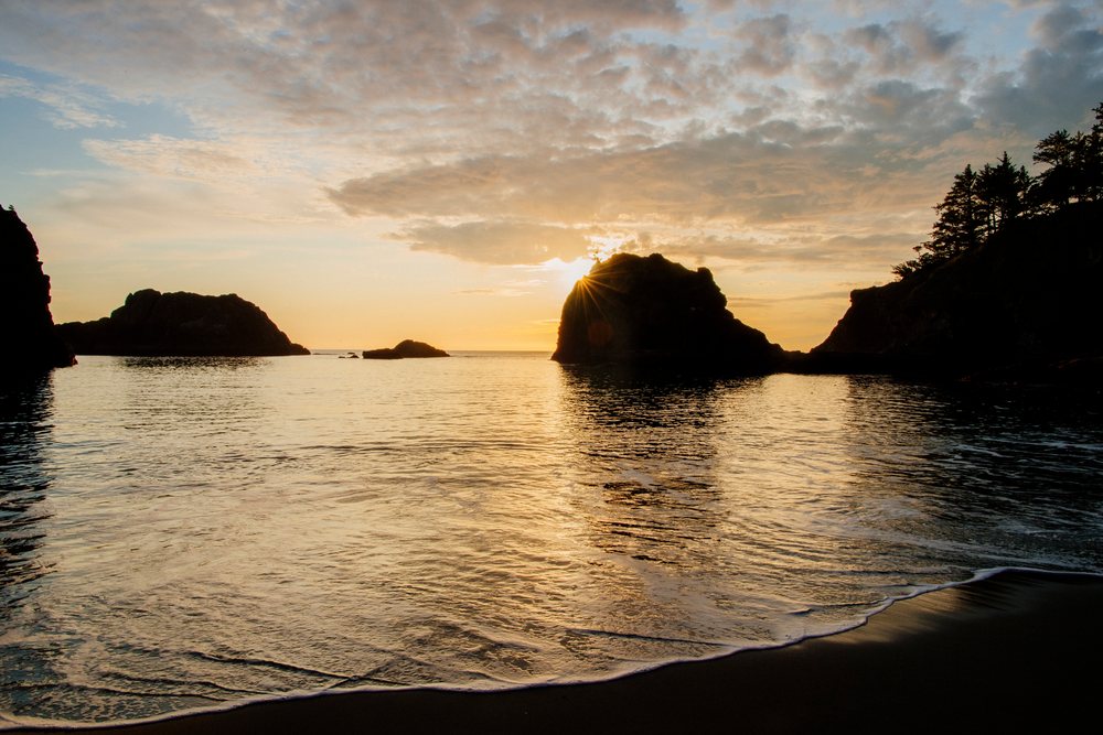 Sunset over ocean and rock formations Oregon
