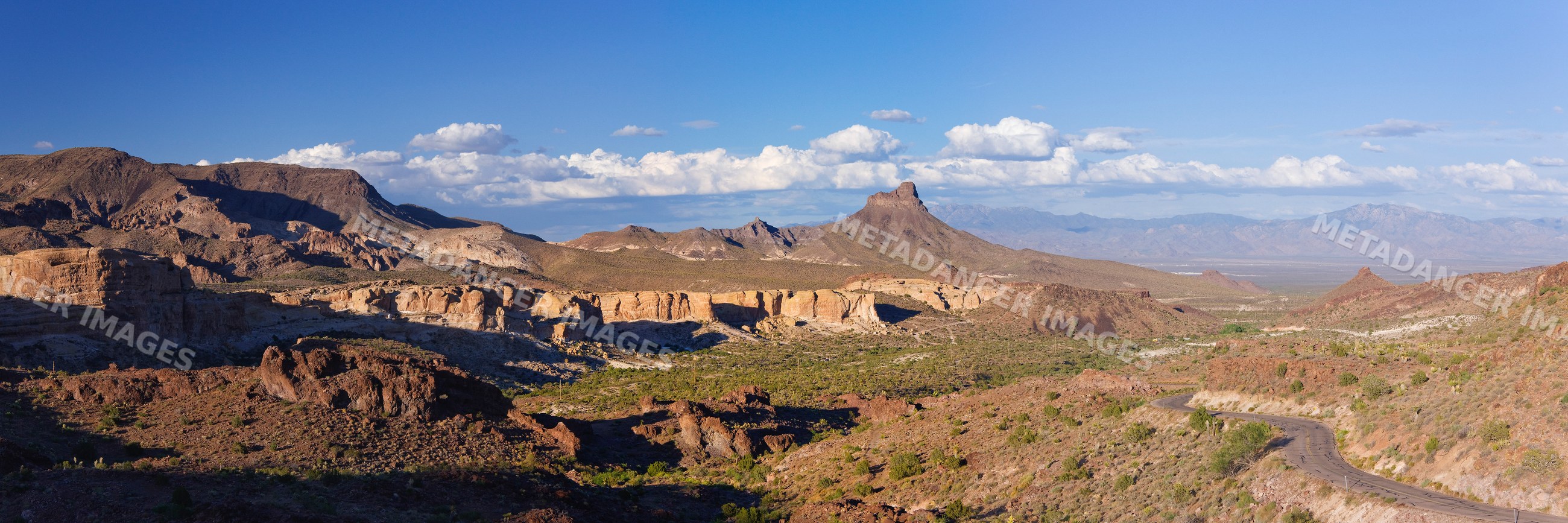 Oatman highway winding through desert mountains between arizona