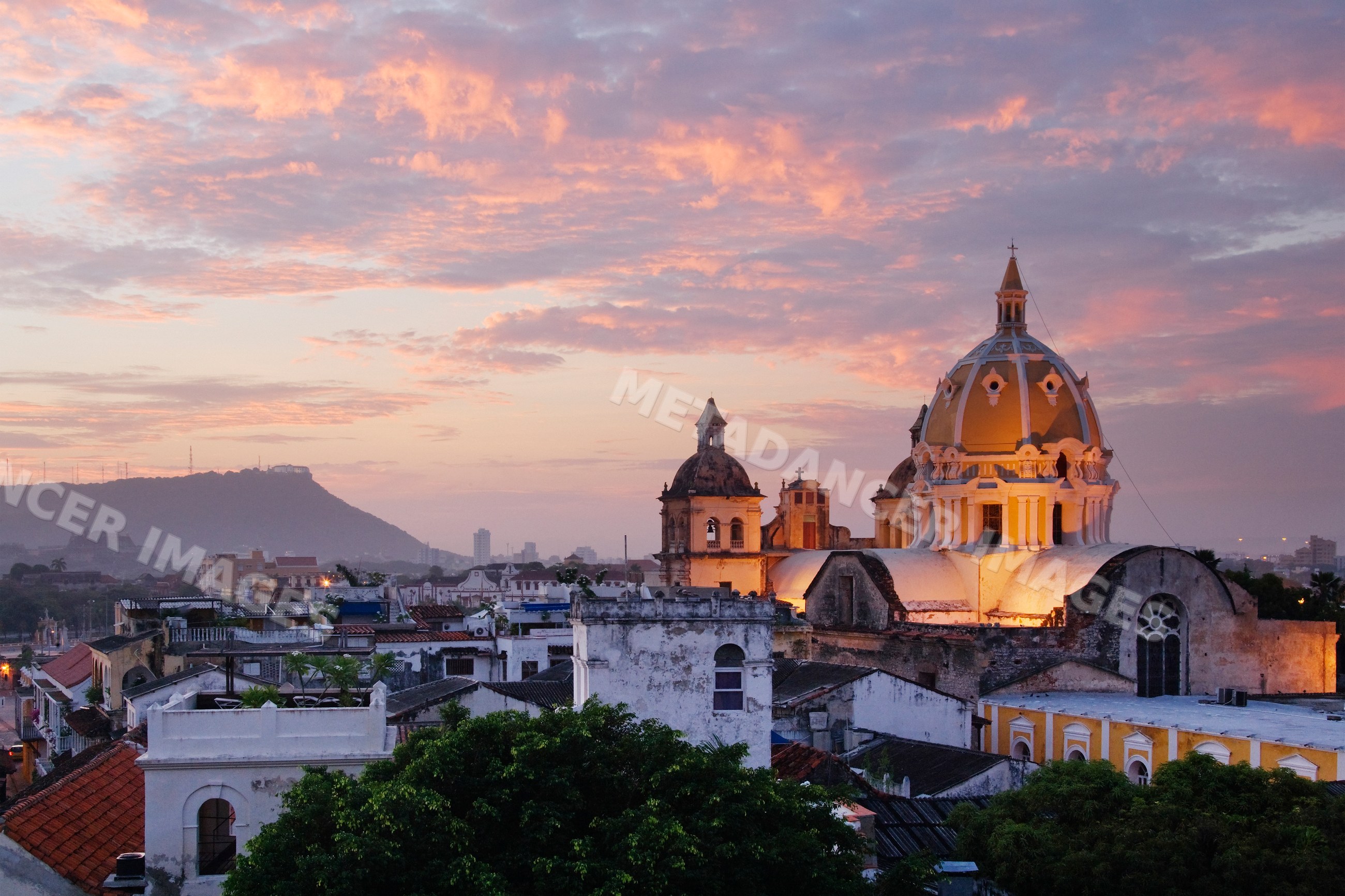 Iglesia de san pedro claver church dome at sunset, colombia
