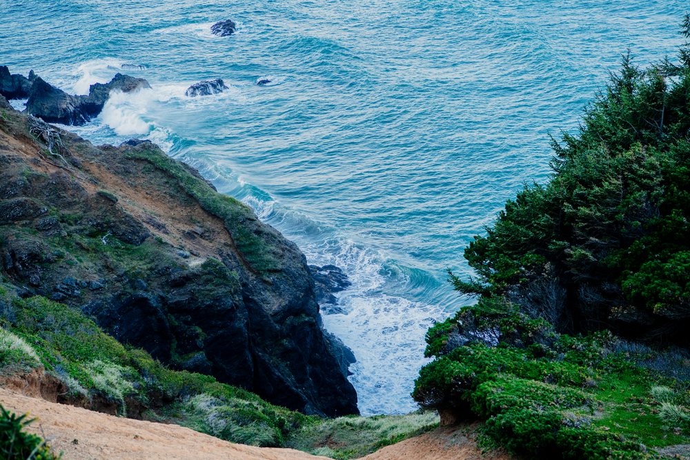 Ocean waves crashing onto cliffs Oregon