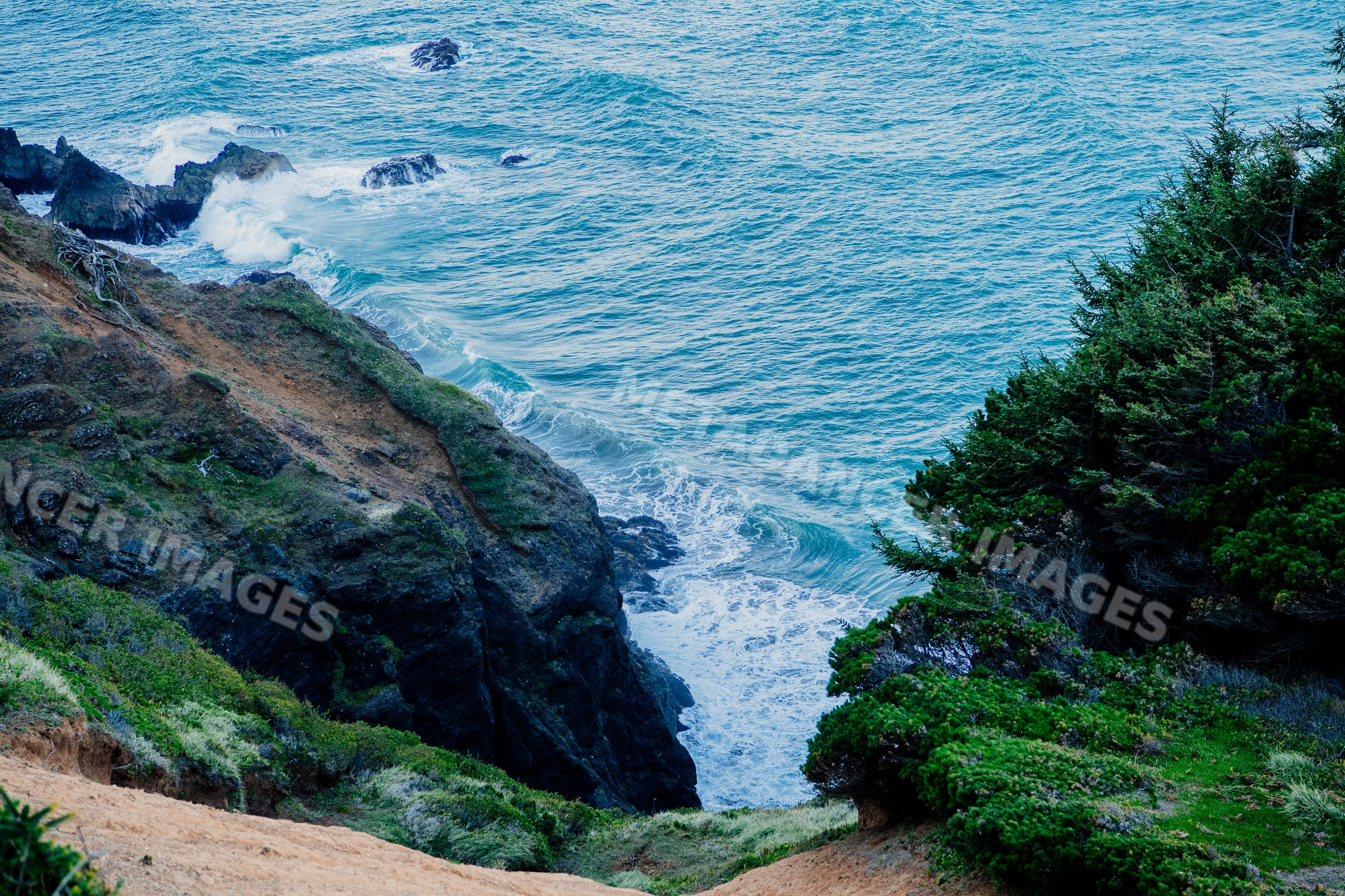 Ocean waves crashing onto cliffs Oregon