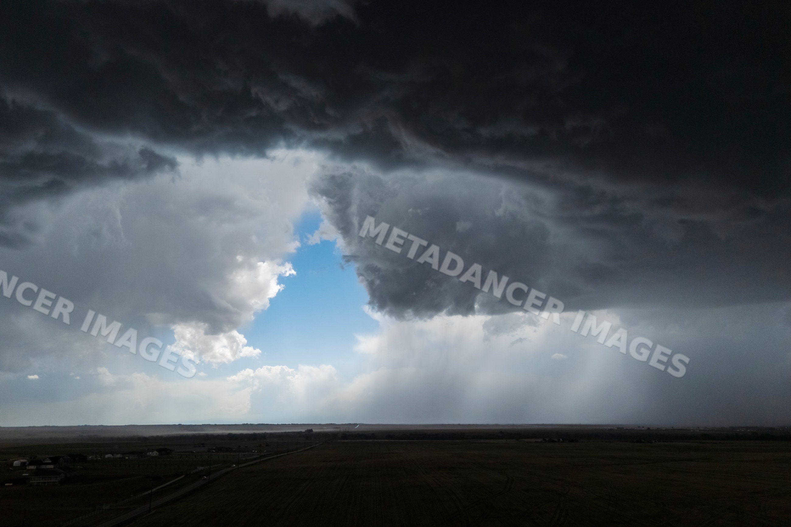 Rear flank downdraft storm cloud over fields near byers, colorado